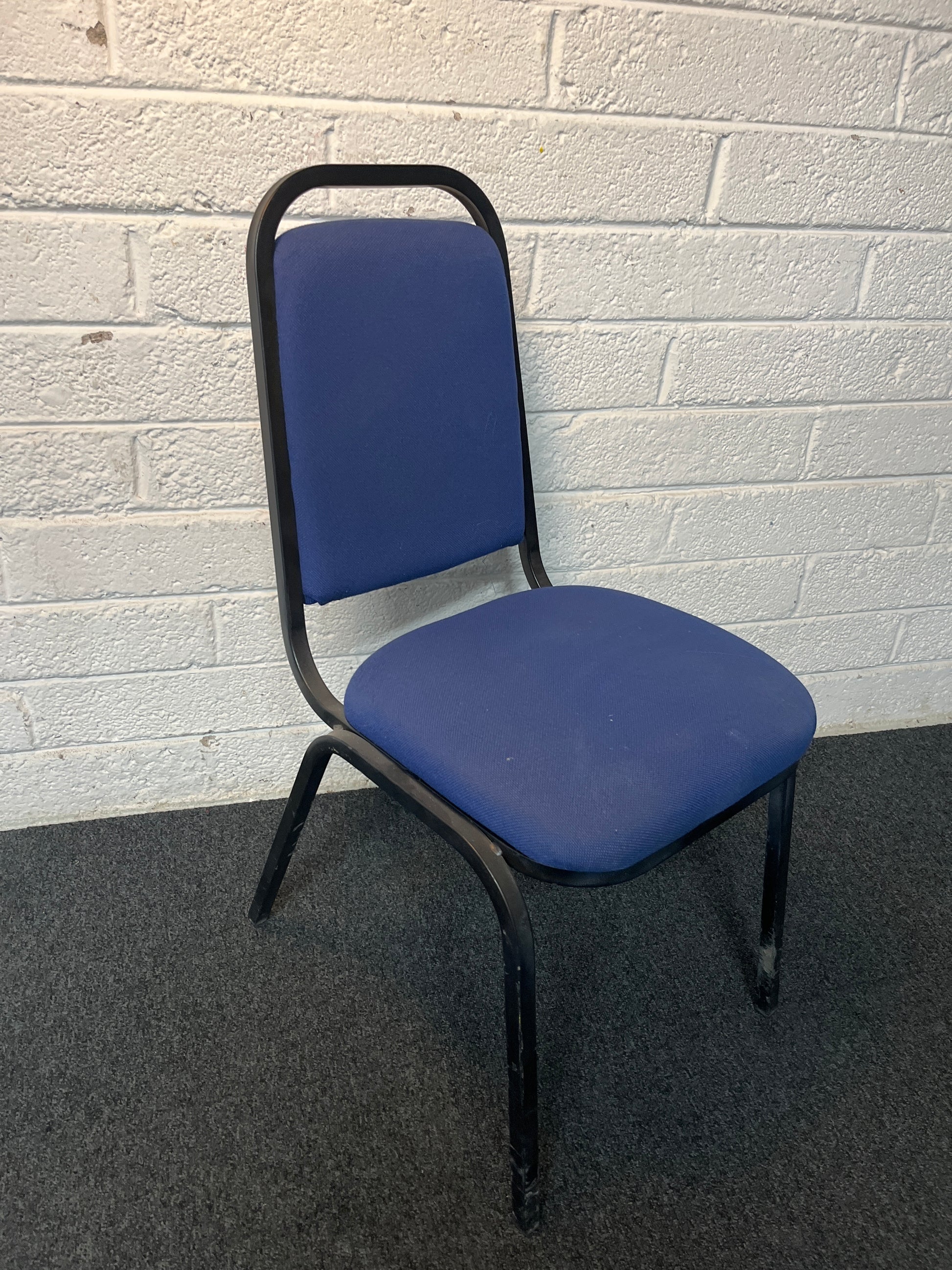 SECONDHAND black metal blue fabric stacking chair
