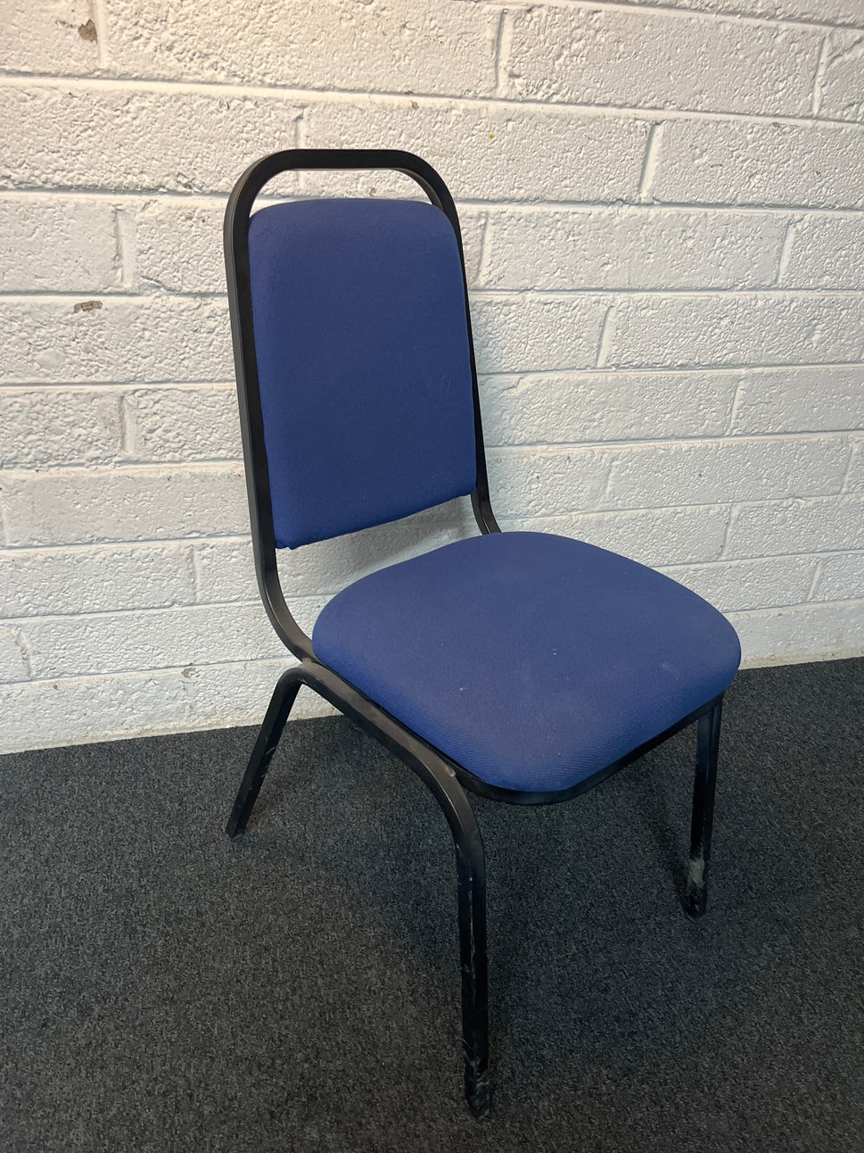 SECONDHAND black metal blue fabric stacking chair