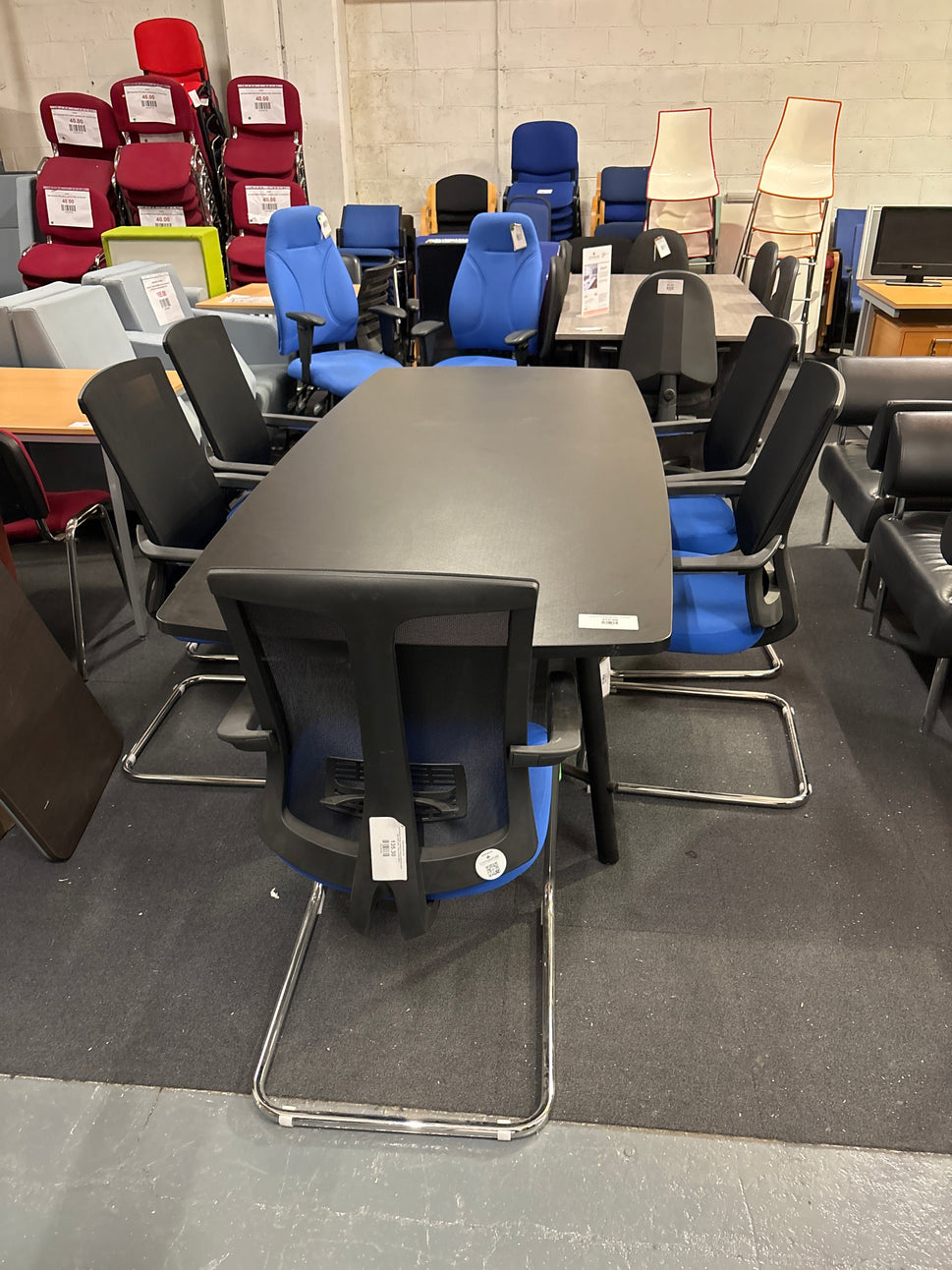 LIQUIDATED BLACK BARRELL SHAPE BOARDROOM TABLE 2.4M LONG