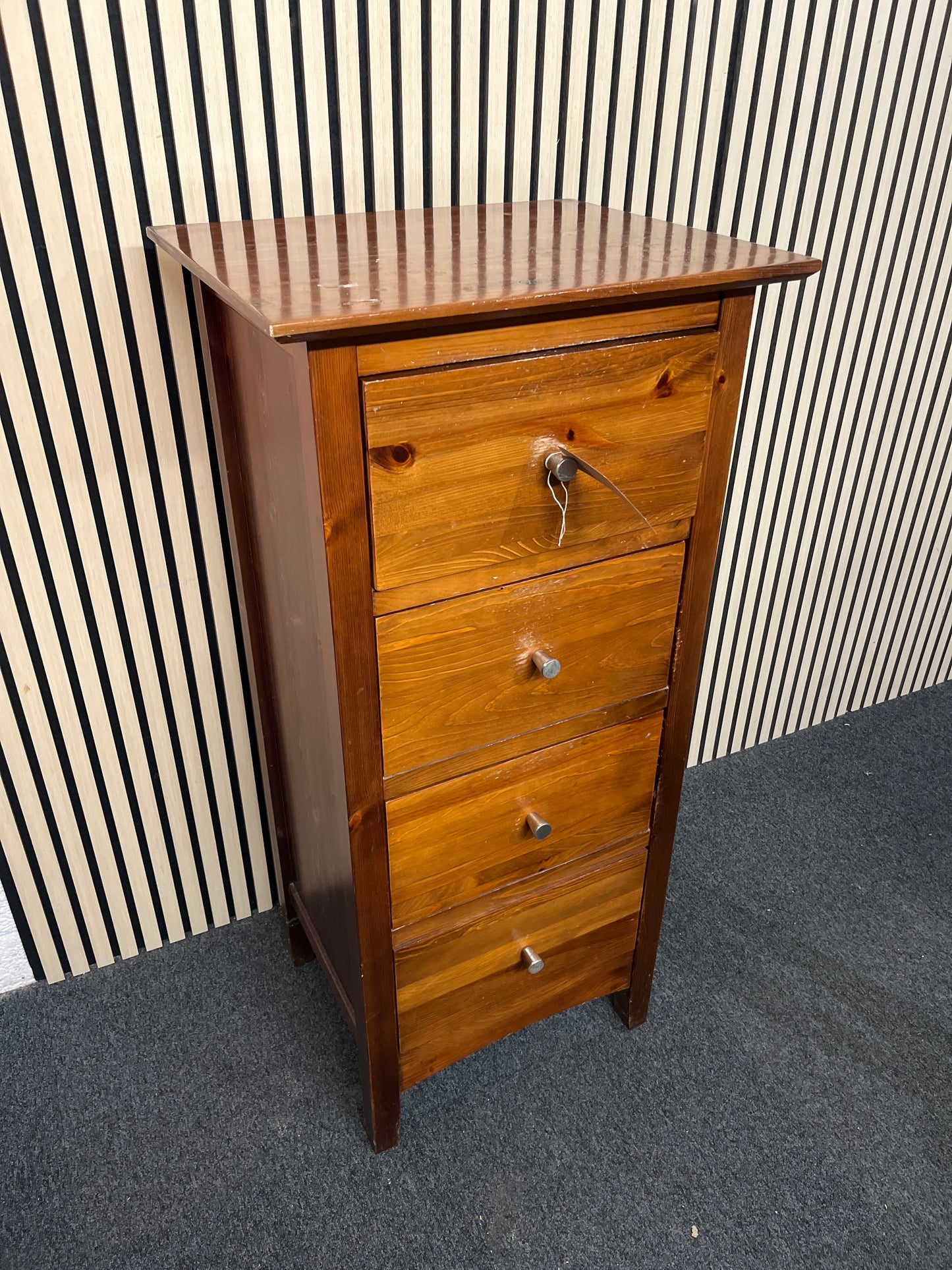 Tall dark pine stained 4 drawer tall boy (H 120 x W 56 x D 46 cm)