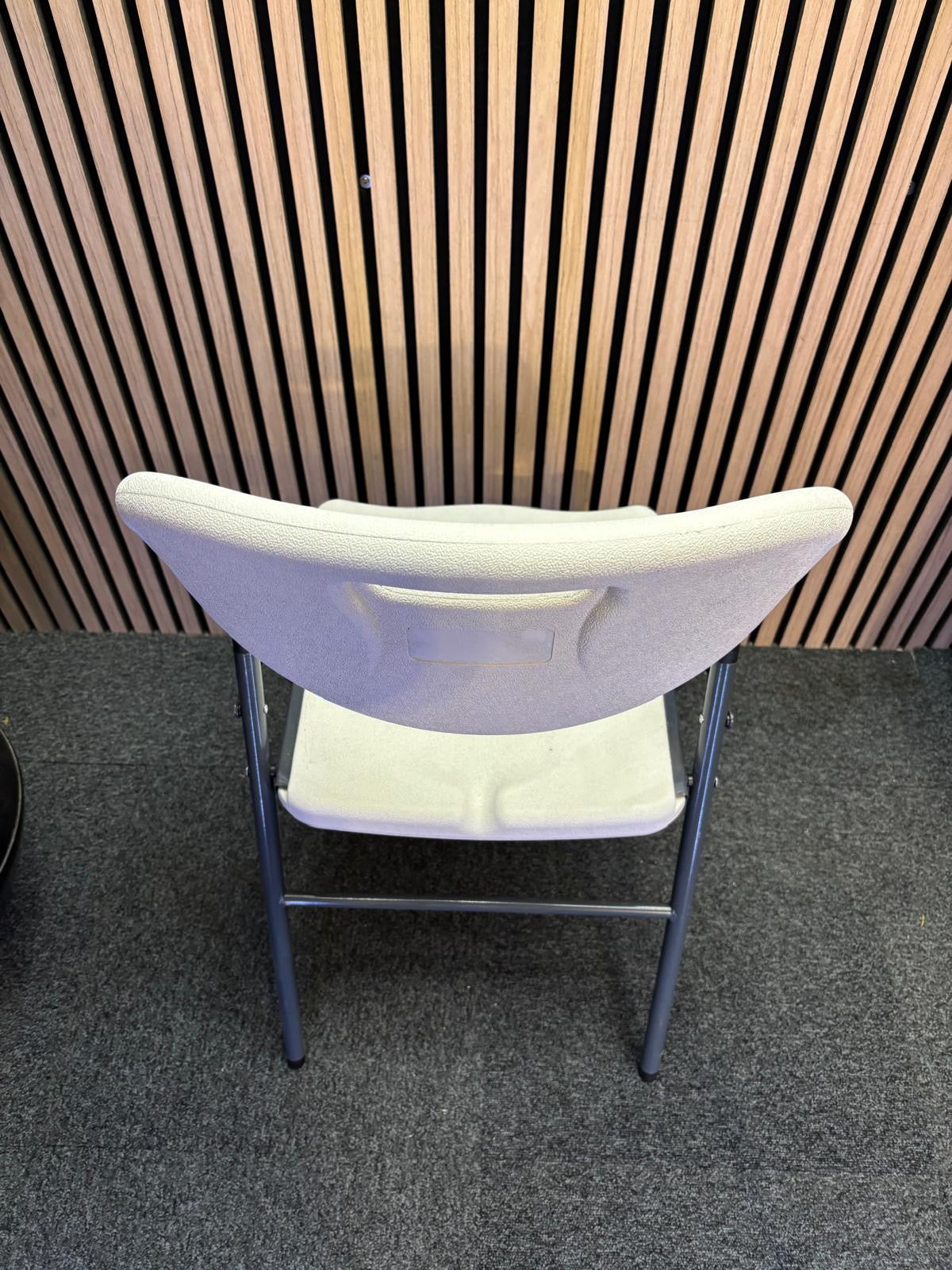 Ex Demo Hebe steel folding chair with blow moulded seat and back in white