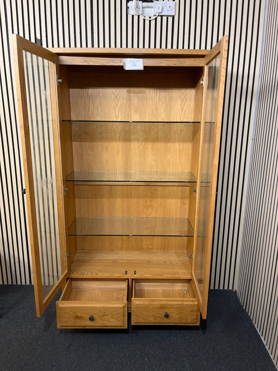 Solid oak display cabinet with glass doors,base drawer and internal lighting (h 183 x w 100 x d 40 cm)  44286