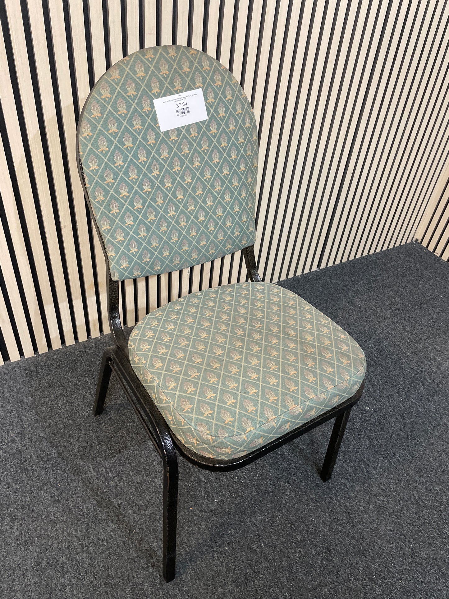  black metal framed green fabric seat and back stacking banquet chair 2425