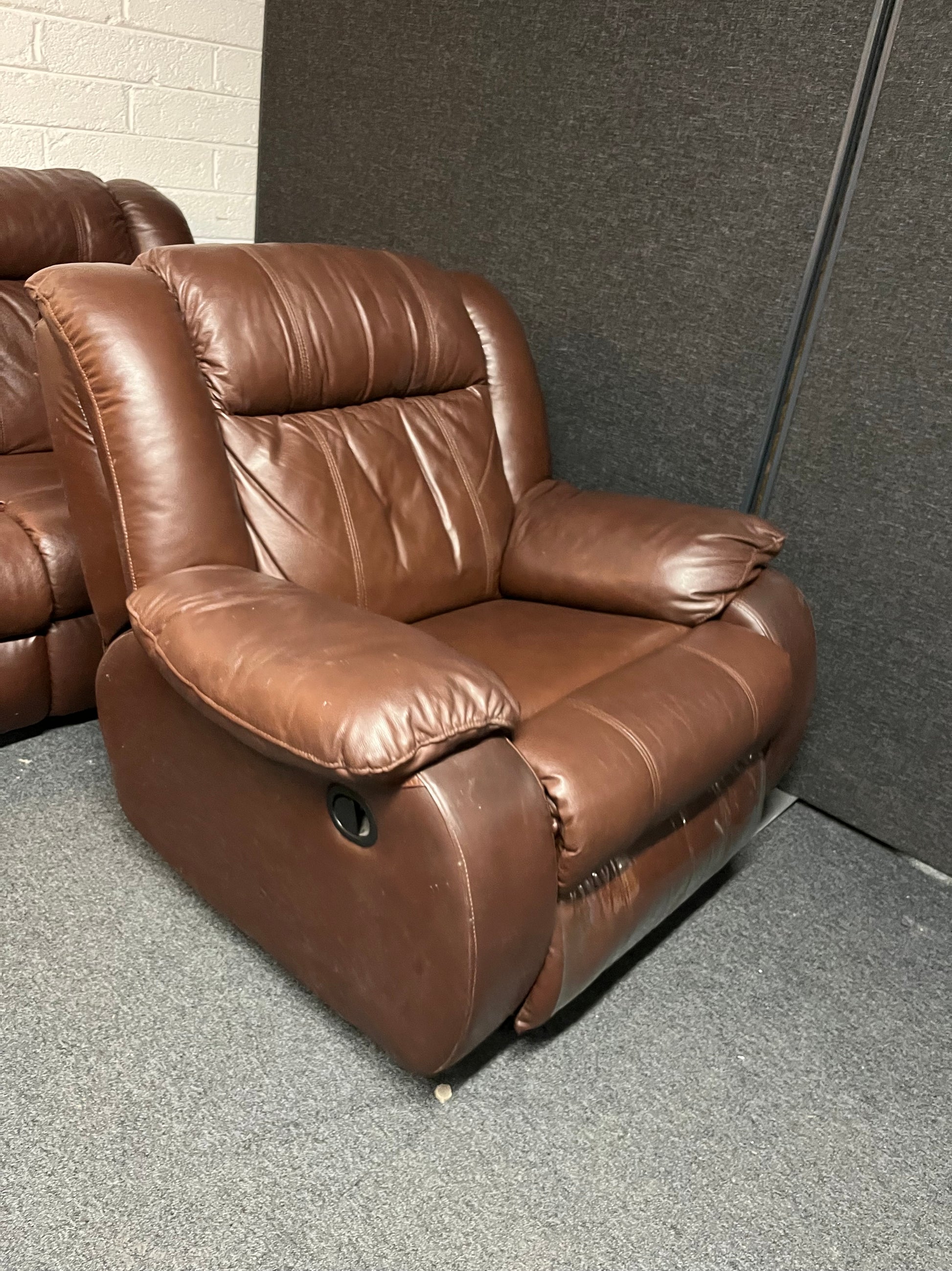 Dark brown leather 2 seater and matching rocking recliner armchair 2225