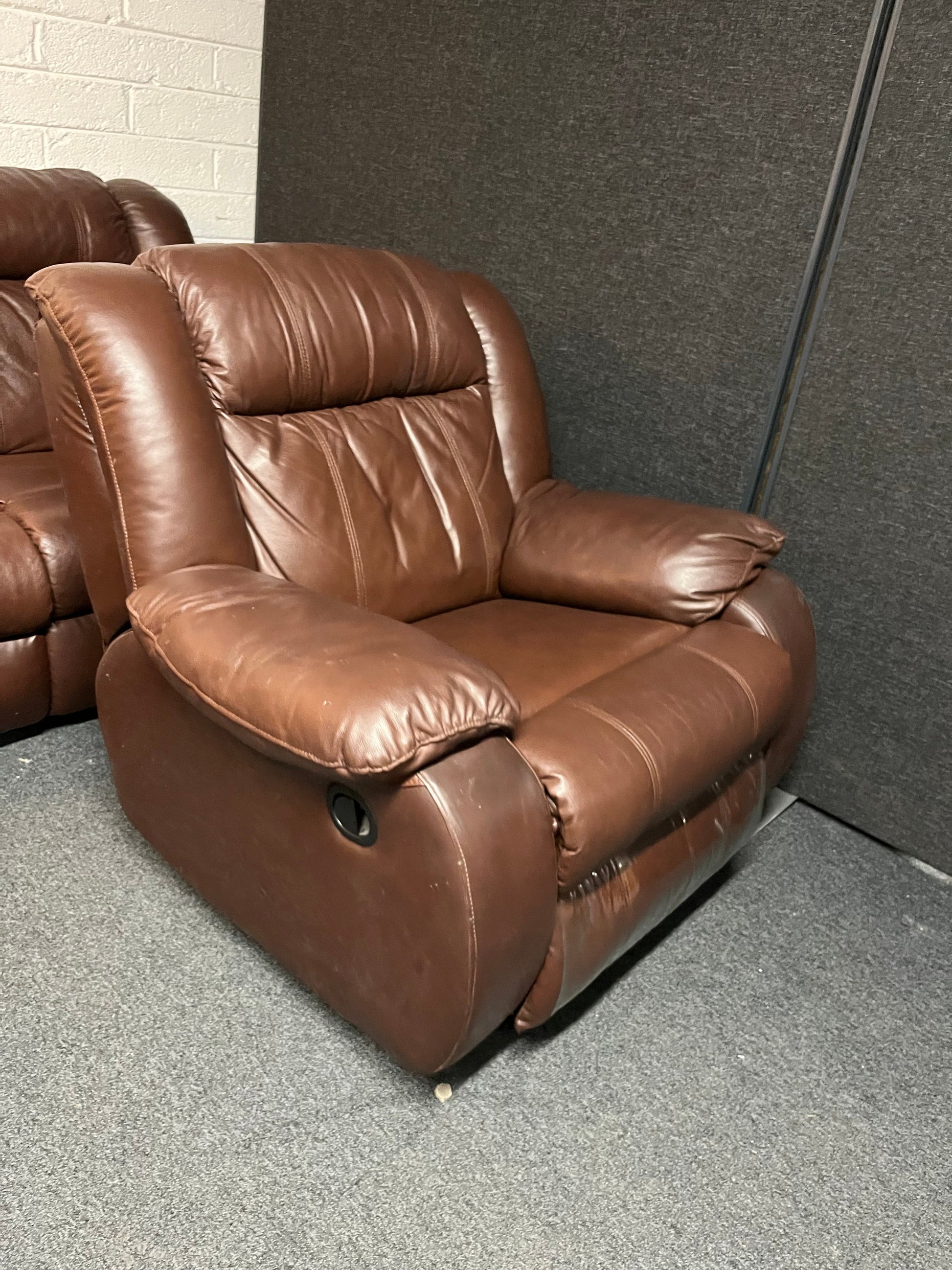Dark brown leather 2 seater and matching rocking recliner armchair 2225