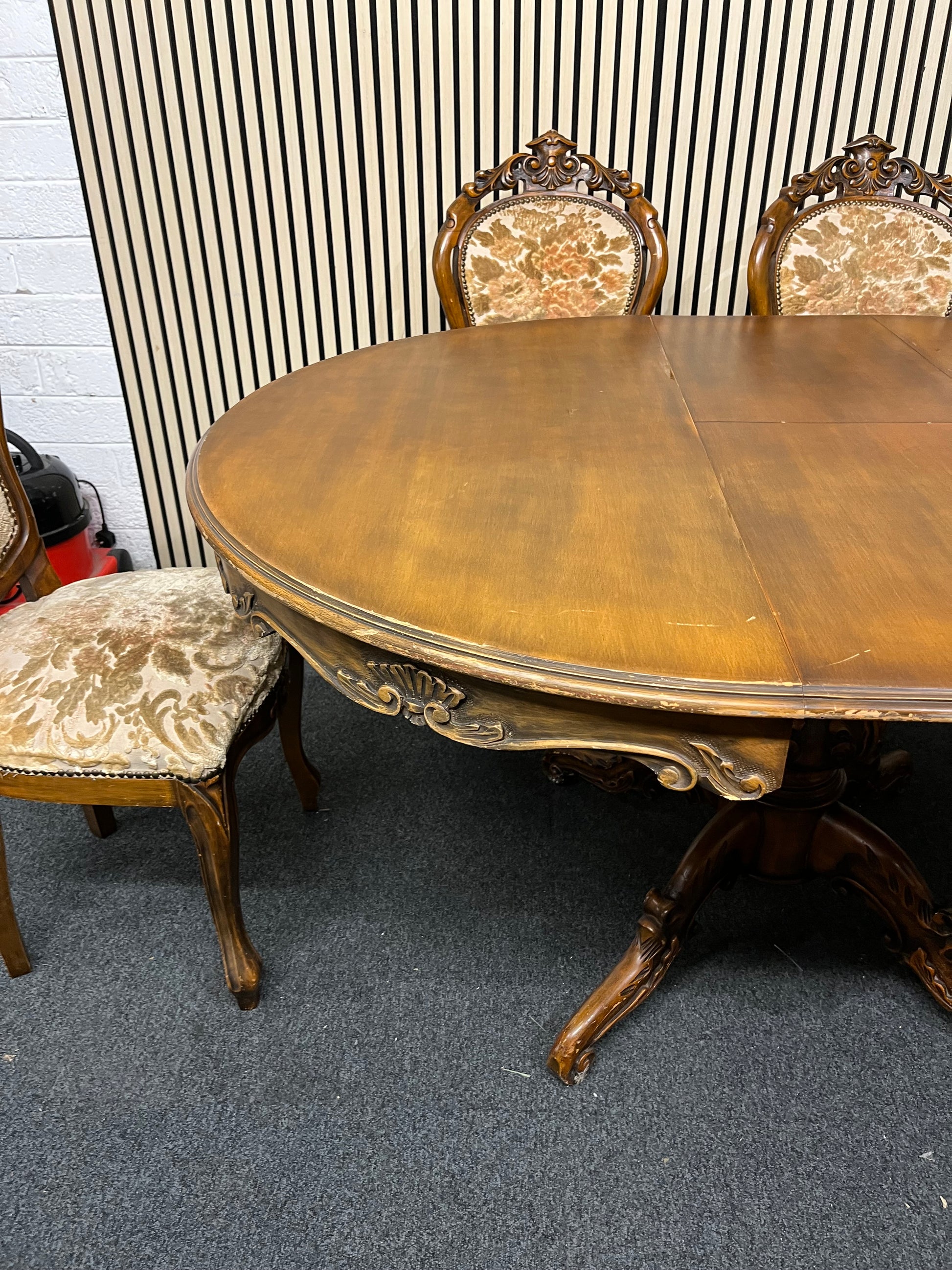 Ornate dark wood dining table with central column base 6 matching darkwood framed floral fabric seats  2325