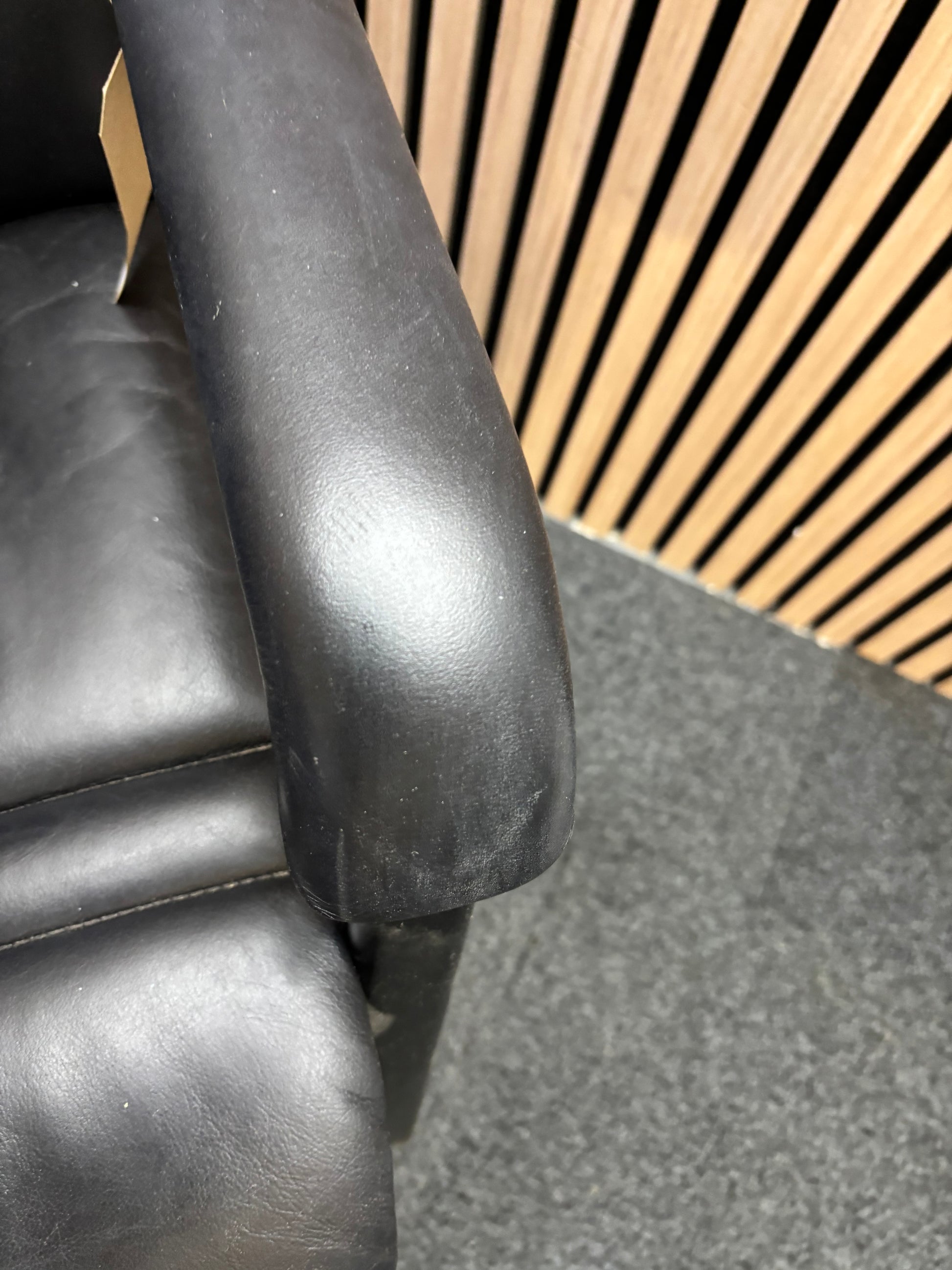 Paud secondhand black leatherette meeting chair with solid black metal frame