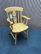 Traditional solid wood armchair with spindle back and decorative splat  44482