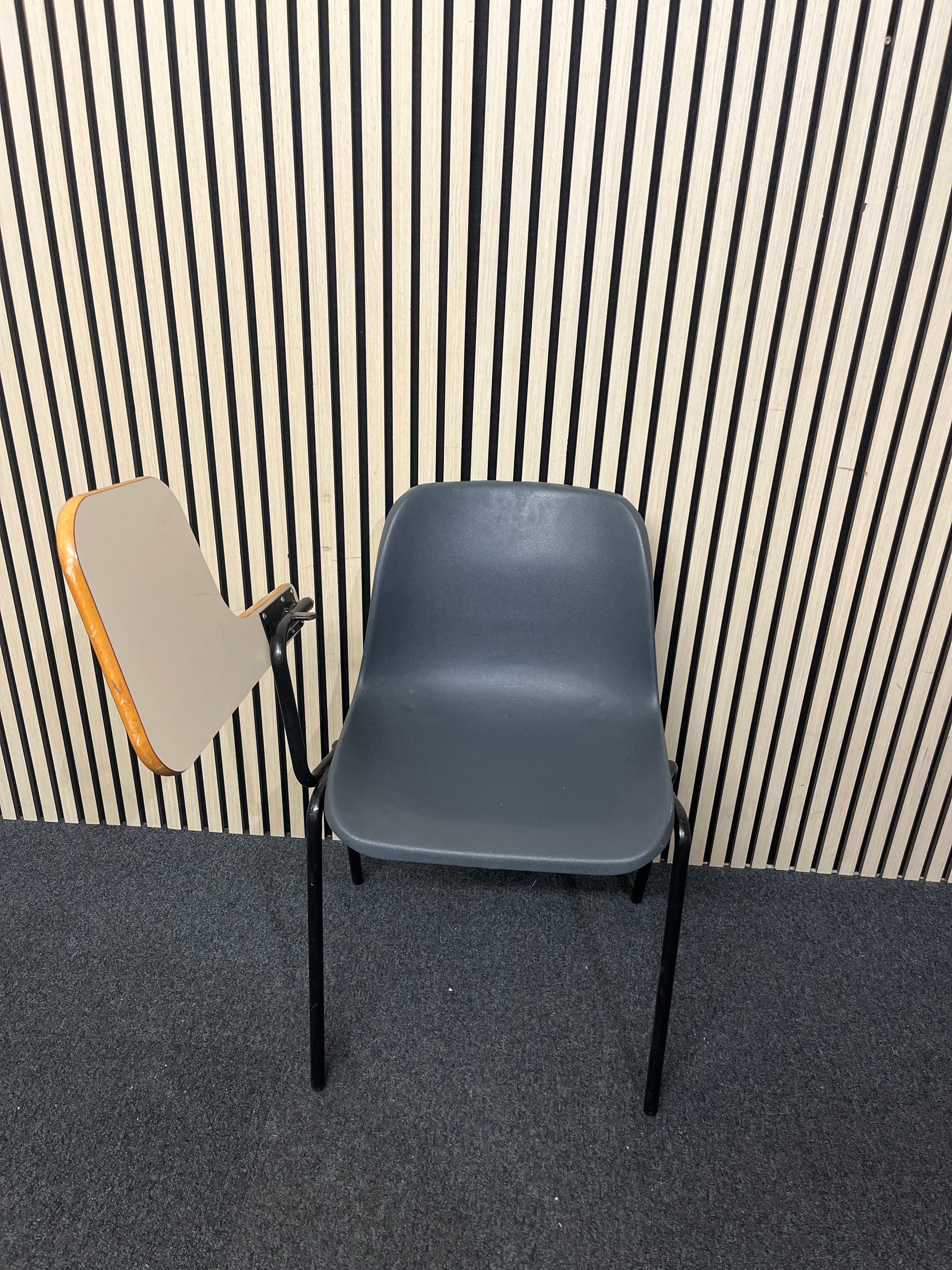 Polyprop stacking chair, black metal frame with wooden writing tablet 1425