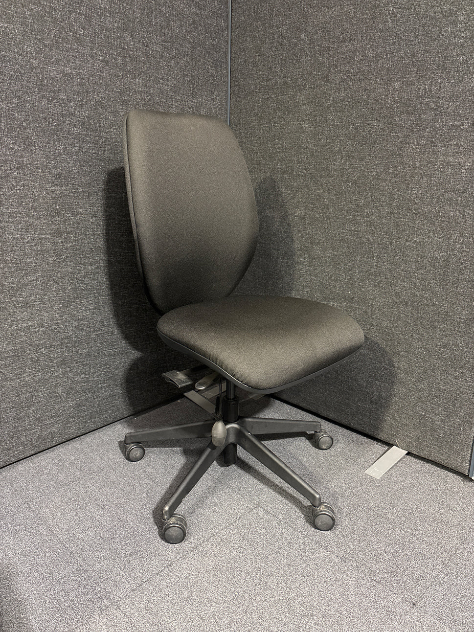 Second Hand black fabric swivel chair with no arms