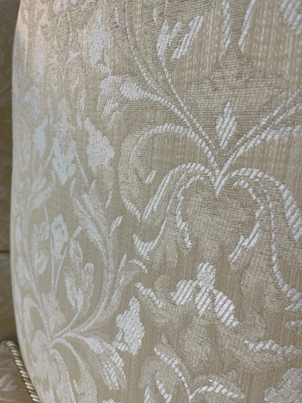 Cream mix fabric Queen Anne armchair solid wood frame, brass castors. 2225