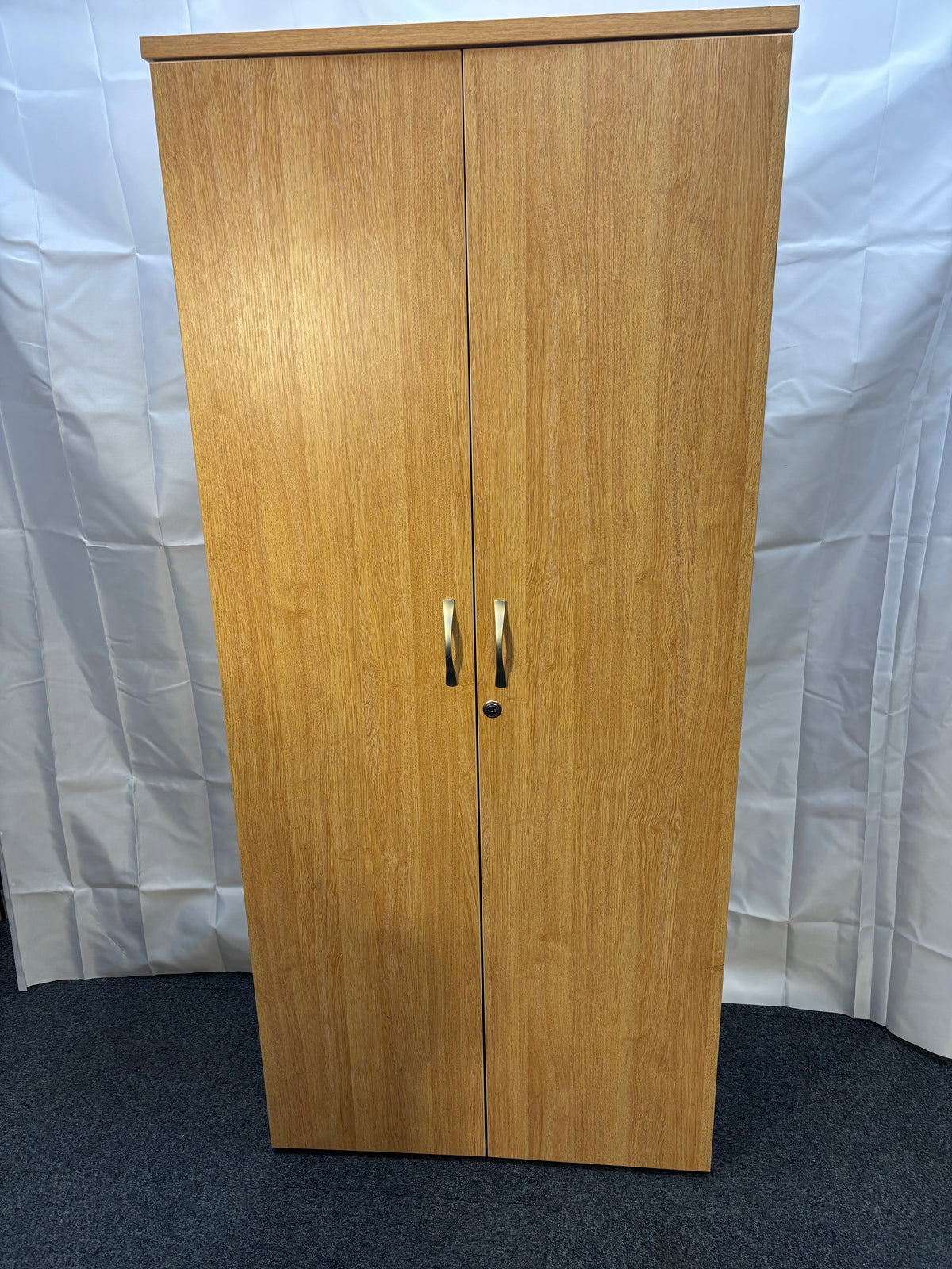 Tall oak 2 door storage unit with internal wooden shelves and key 180Hx47Dx80W  J3927
