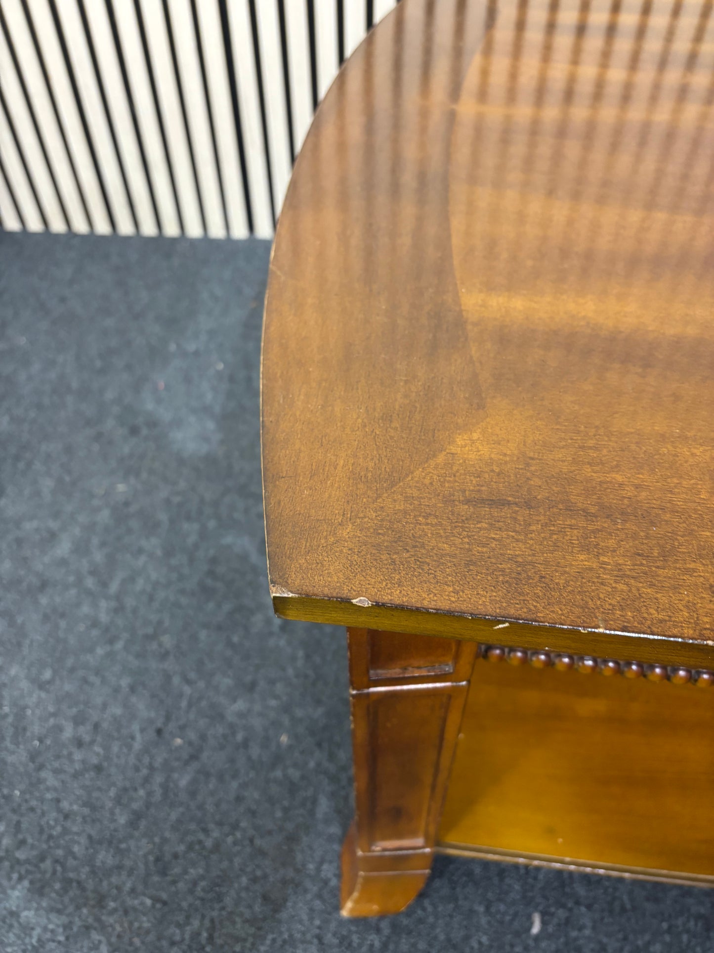 Solid dark wood stained low rectangular coffee table with ornate black metal details 2425