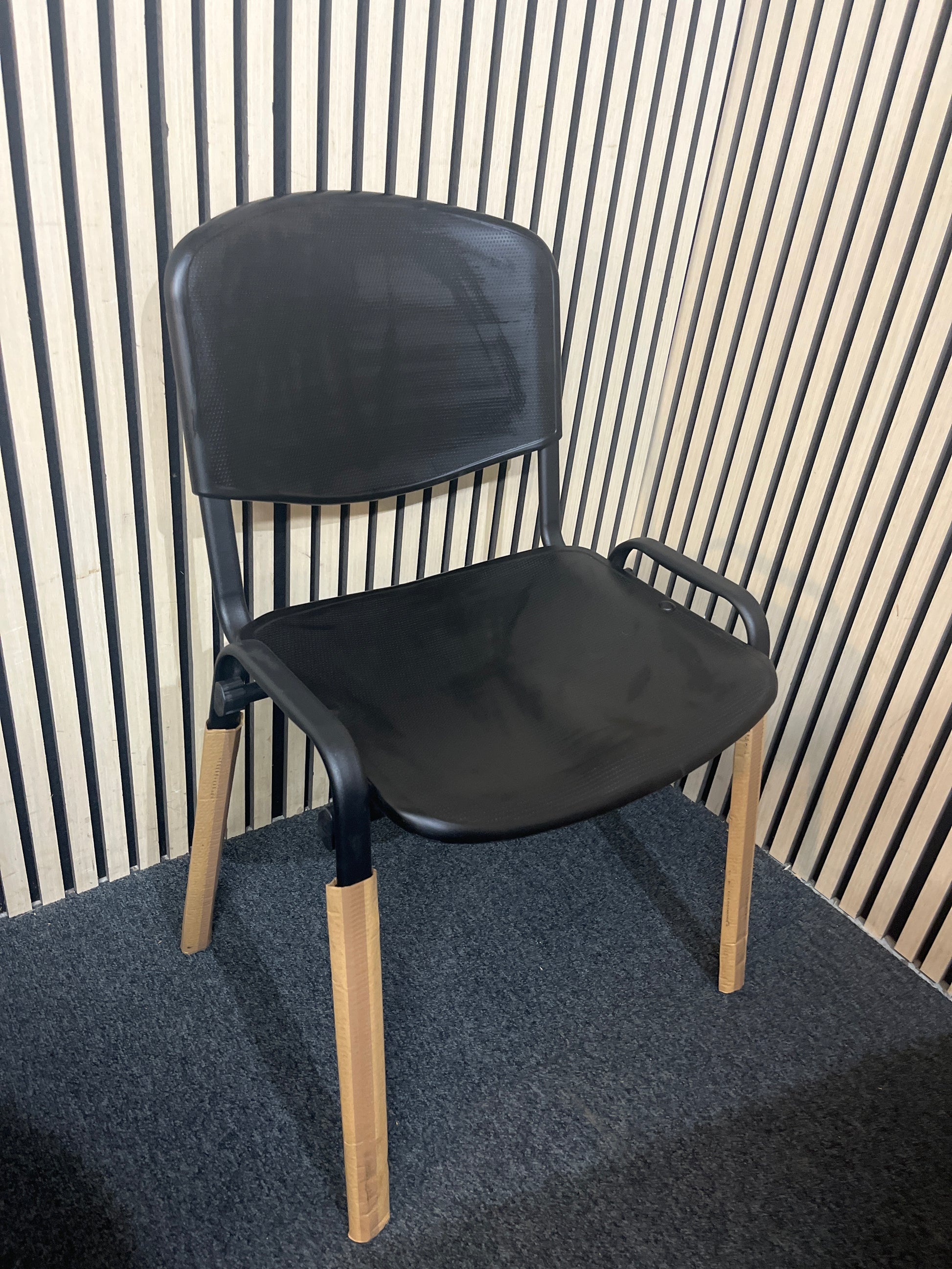 NEW black plastic taurus stacking chair with solid metal frame