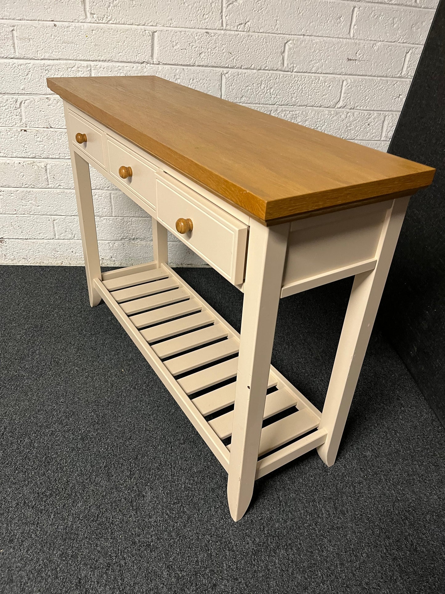 Solid oak top slim console table with cream painted frame, 3 drawers and shelf  1225