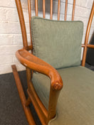 Switch Solid oak high back ornate rocking chairs with sea green fabric seat cushion and back. Missing one spindle on the back  2225 3 image