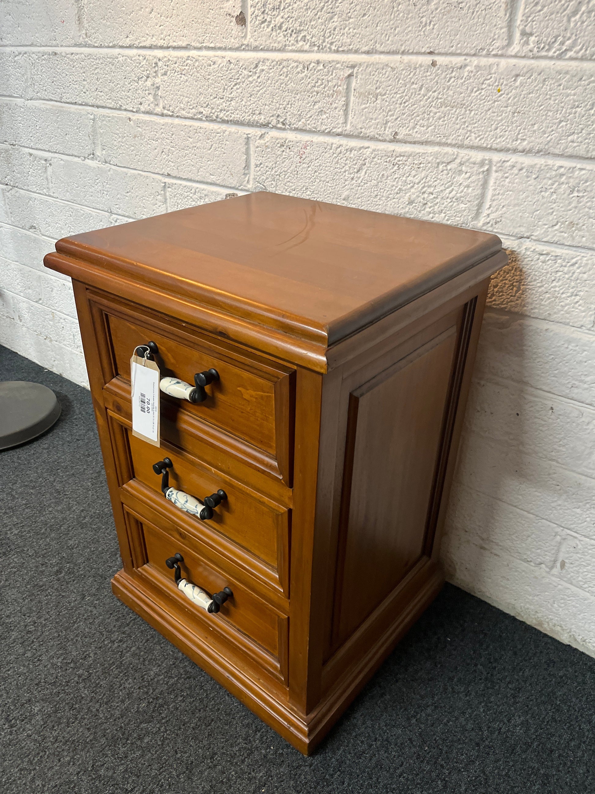 Stained pine 3 drawer bedside locker (H 75 x W 78 xD  44 cm) 2225