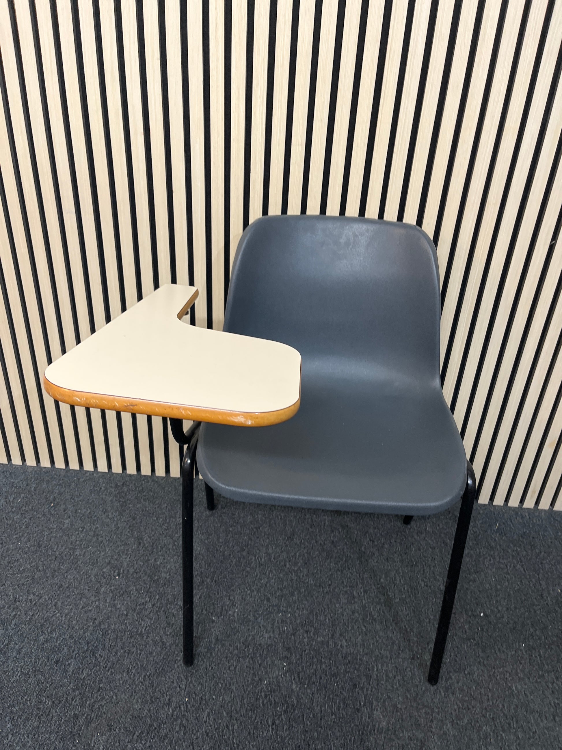 Polyprop stacking chair, black metal frame with wooden writing tablet 1425