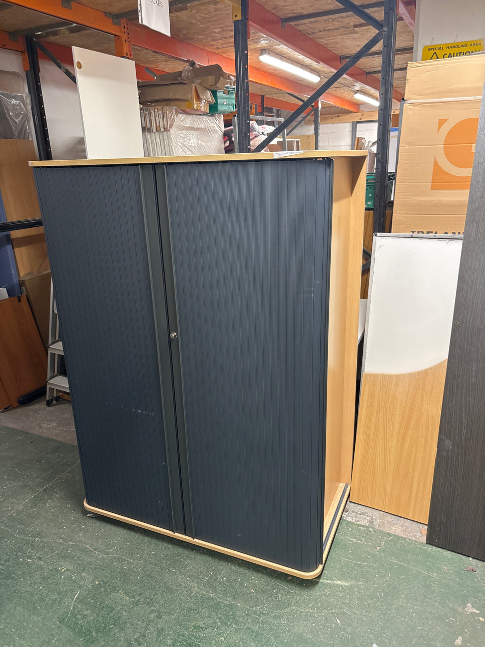 Beech framed tall side opening tambour unit, graphite colour doors with key and wooden internal shelves 152Hx110Wx60D. Price inc VAT. 3 no. Matching in stock