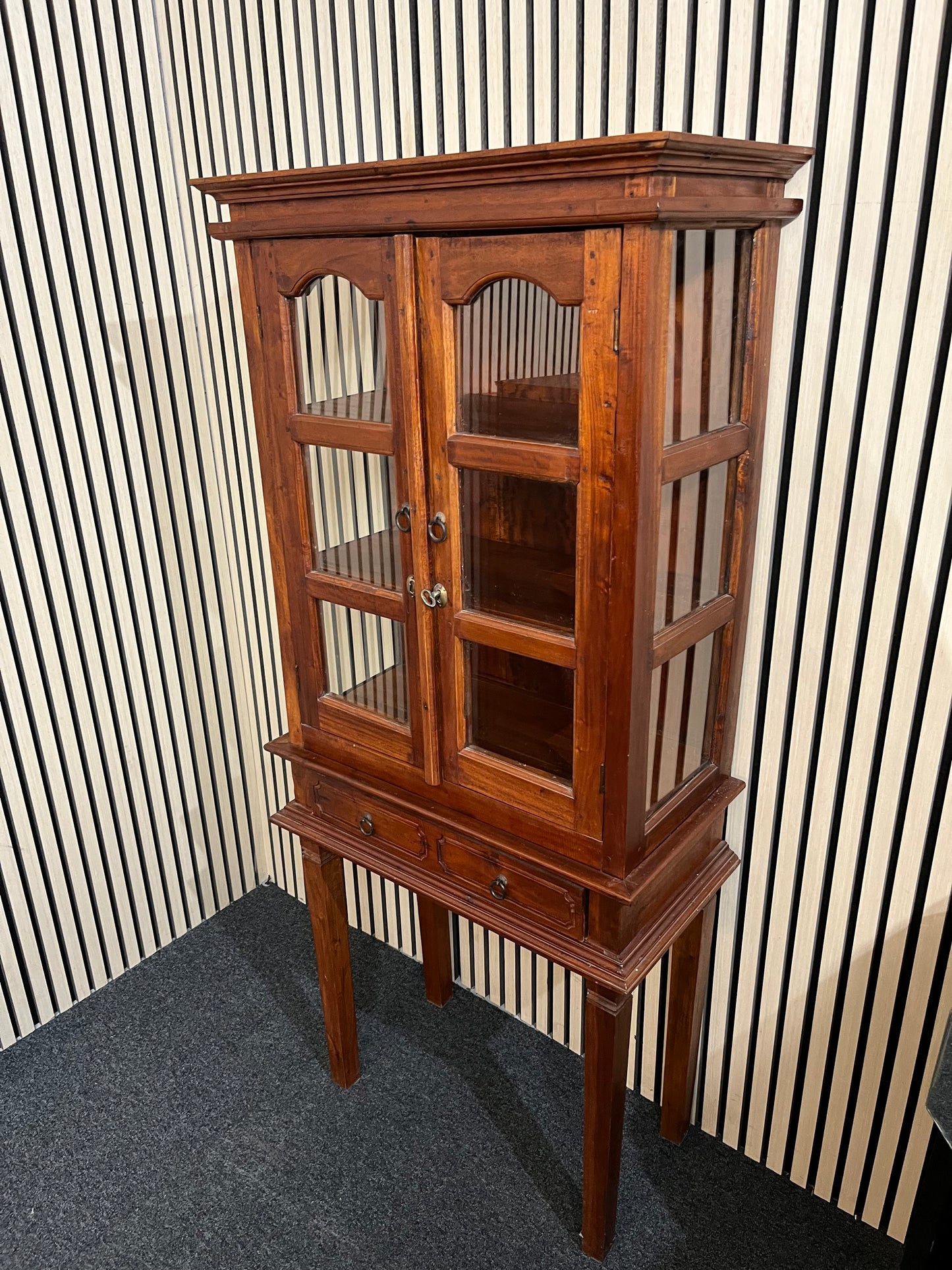Tall solid dark wood stained 2 door glass display unit with 2 no drawers (H 153 x W 670 x D 330 cm) 2425
