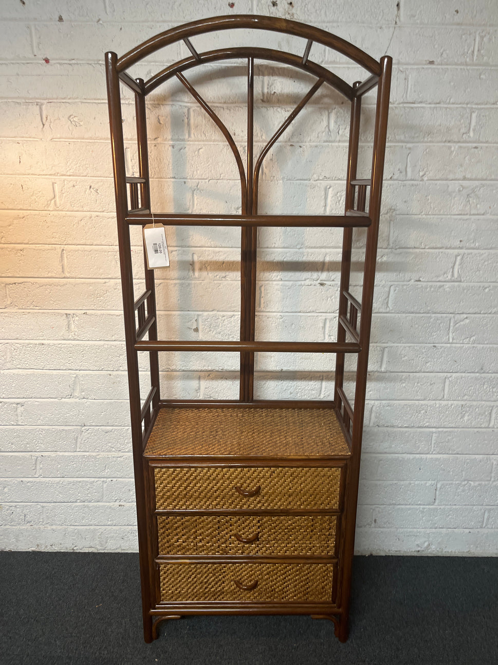 Tall dark cane framed 3 drawer open fronted shelf unit (H 187 x W 69 x D 36 cm) 1325