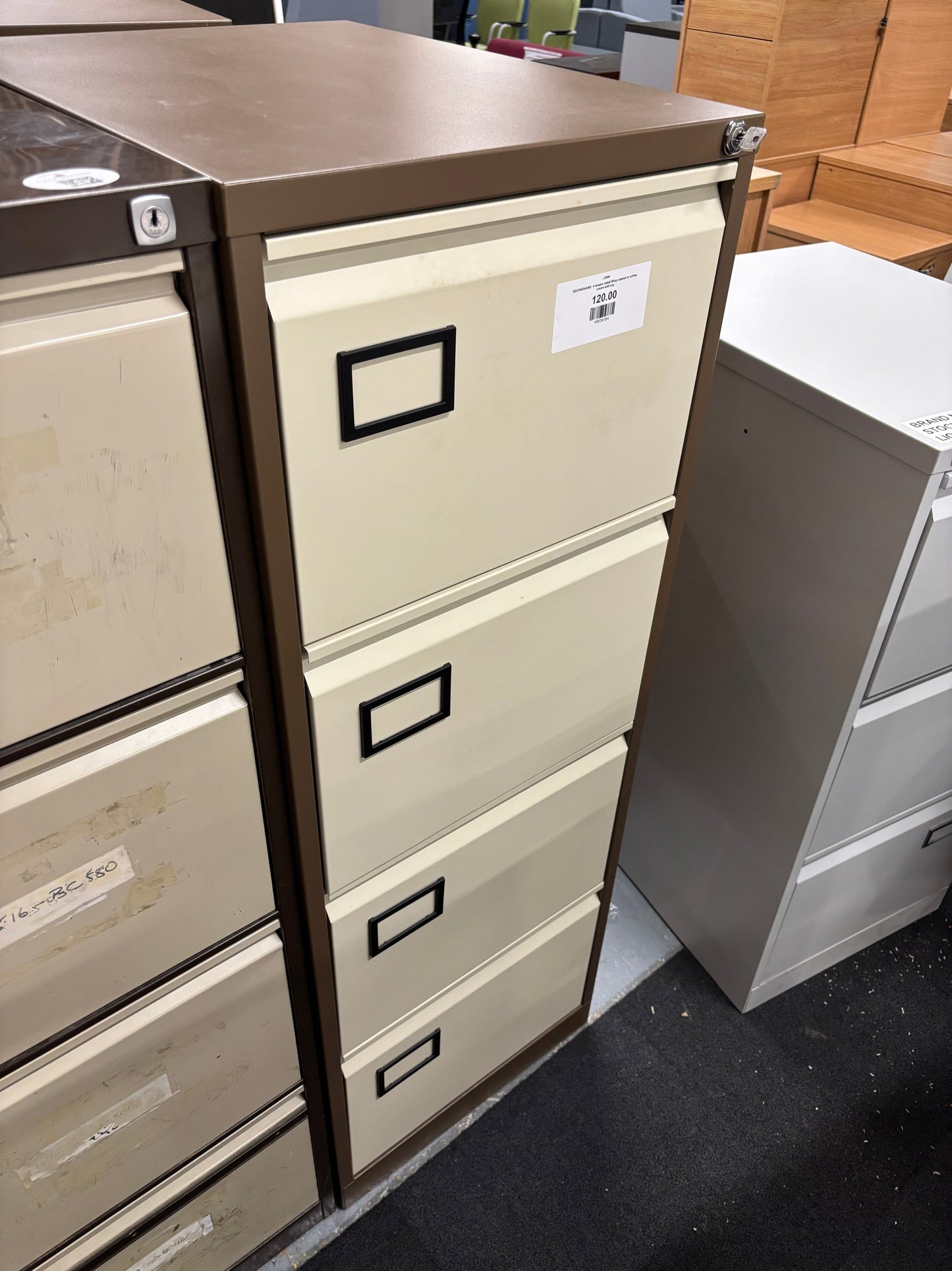 SECONDHAND  4 drawer metal filing cabinet in coffee cream with key
