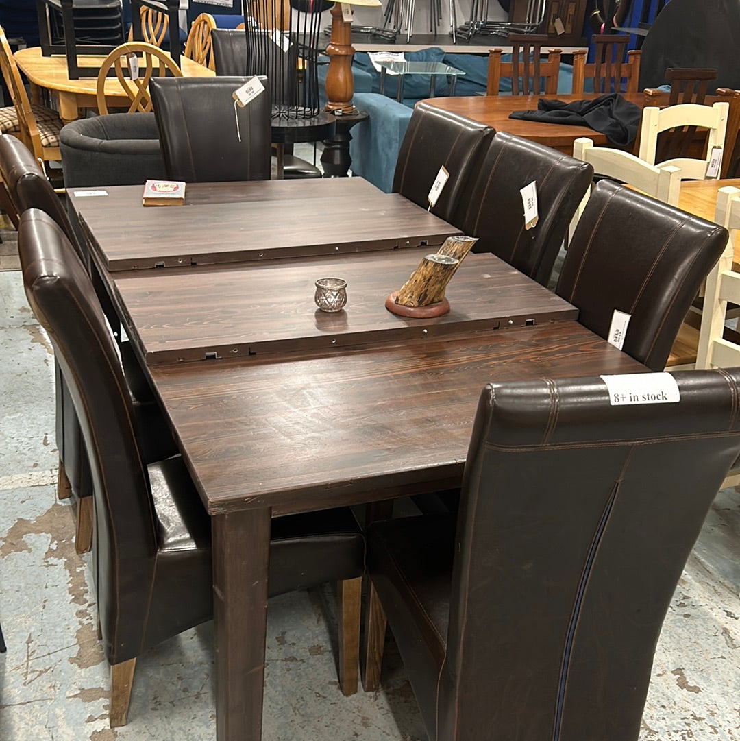 Solid dark wood stained extendable kitchen table