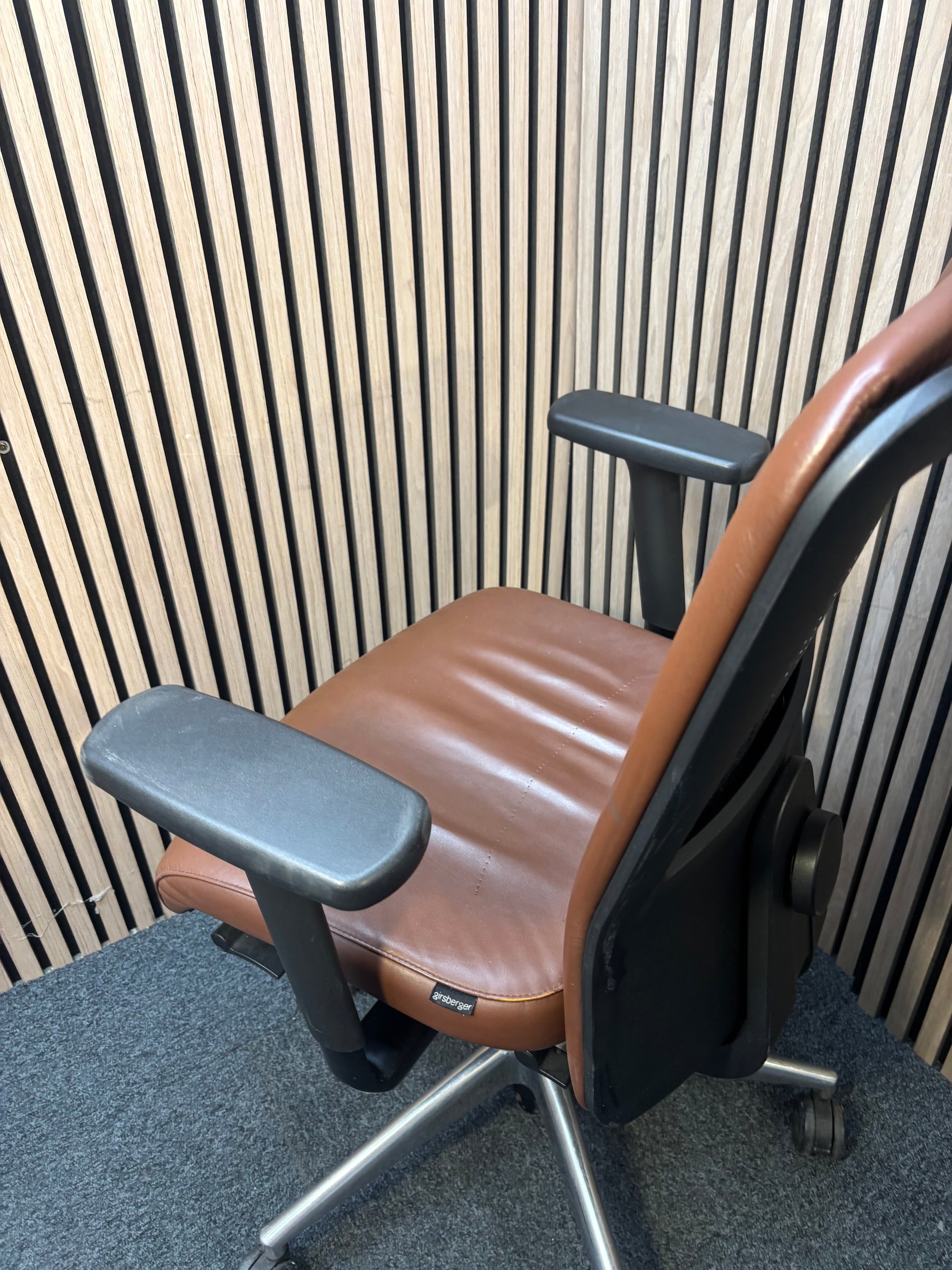 Girsberger high back brown leather multifunction swivel chair with adjustable arms and back rake with polished metal base on castors   J3910