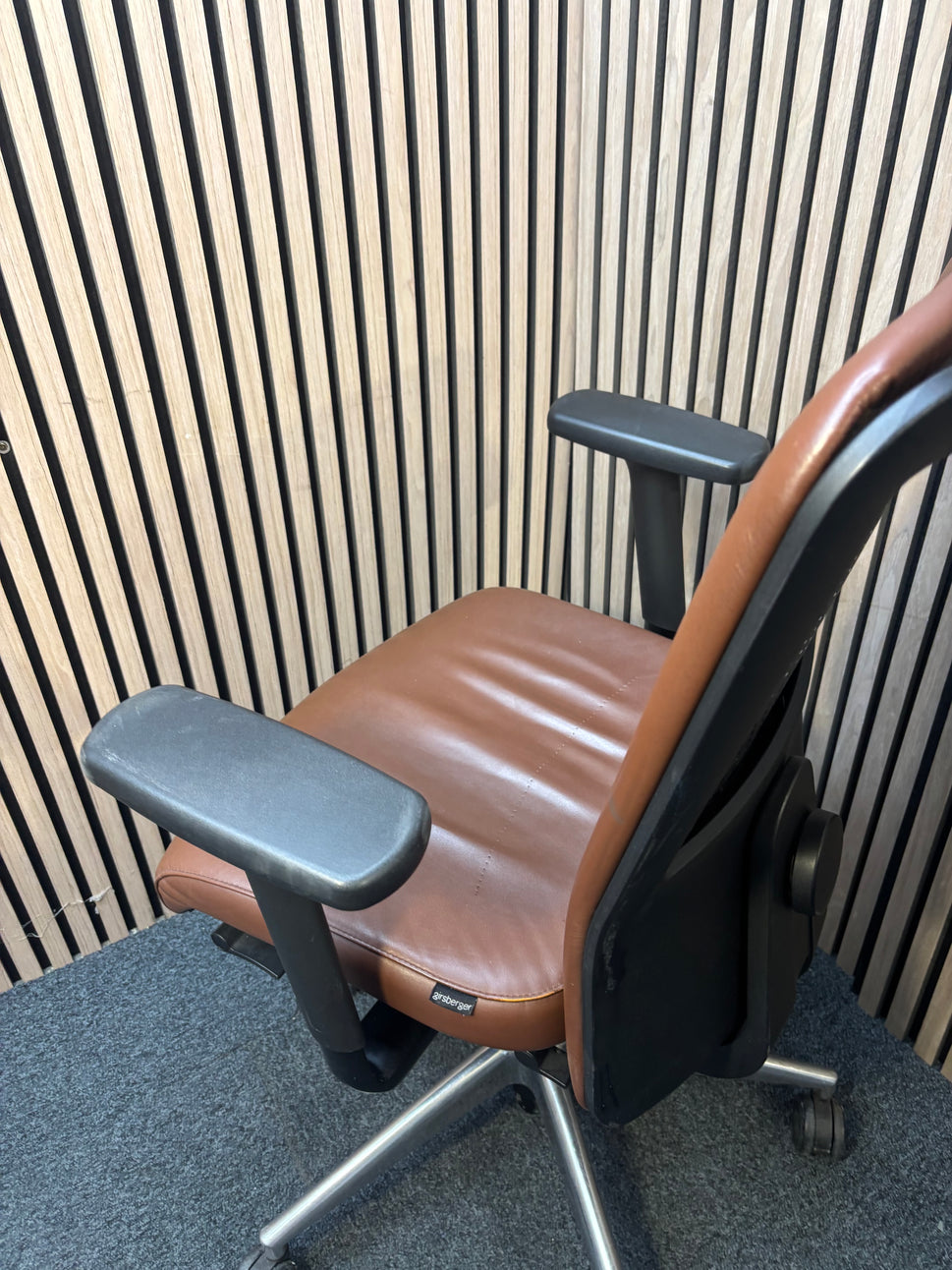 Girsberger high back brown leather multifunction swivel chair with adjustable arms and back rake with polished metal base on castors   J3910