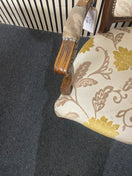 Italian Limogue Carved wooden armchair with floral pattern upholstery and stud detailing.  44731