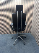Vitra Headline high back Executive office swivel chair with integrated headrest and adjustable Lumbar support, polished chrome frame and heigh adjustable arms on a polished chrome 5 star base