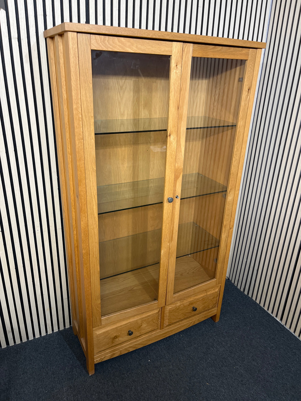 Solid oak display cabinet with glass doors,base drawer and internal lighting (h 183 x w 100 x d 40 cm)  44286