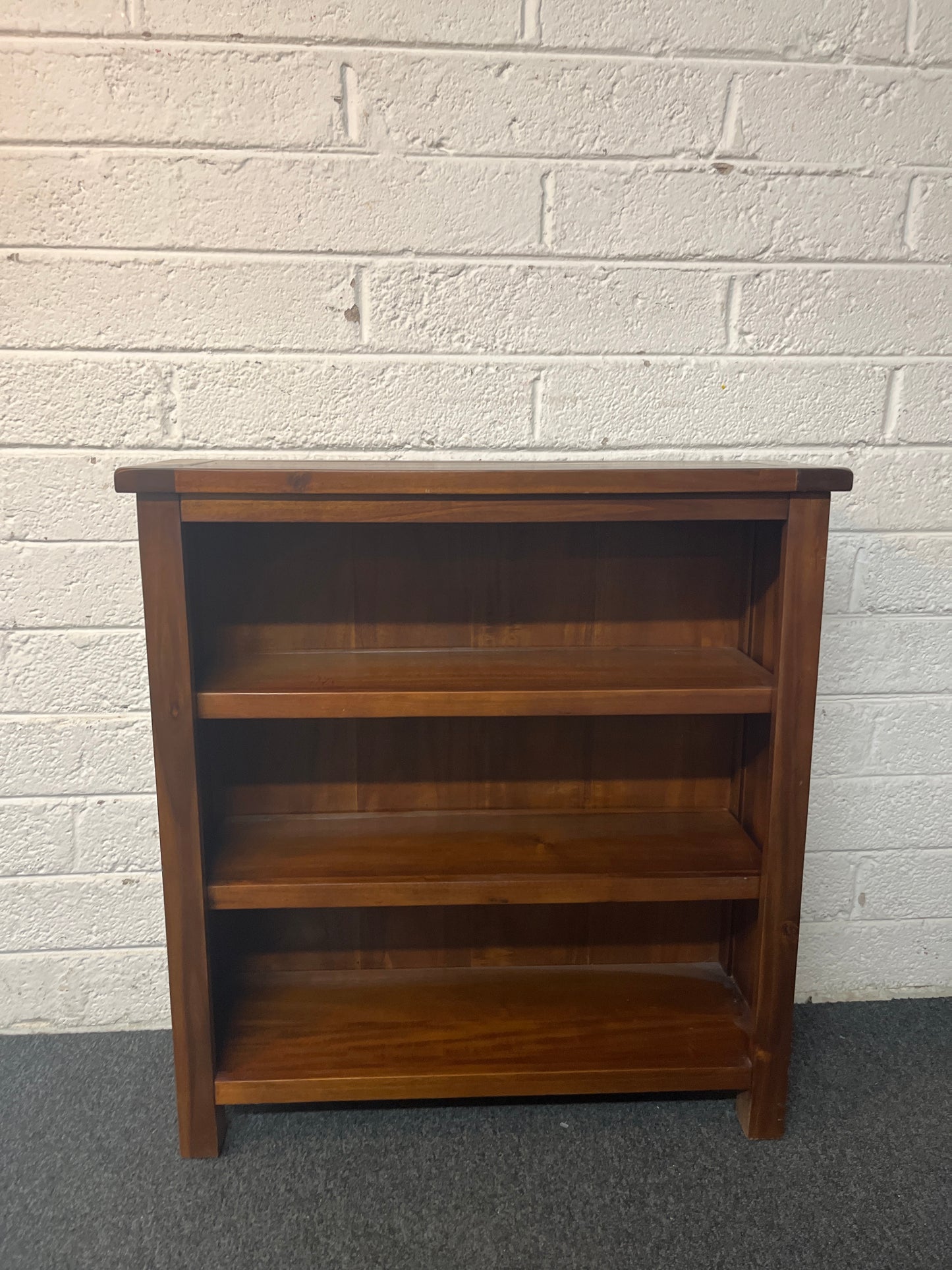 Low solid dark wood stained open bookcase (H 80 x W 75 x D 25 cm) 1325