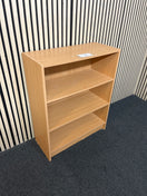 A compact wooden storage unit featuring three open display shelves. (H 84 x W 69 x D 29 cm)  44583