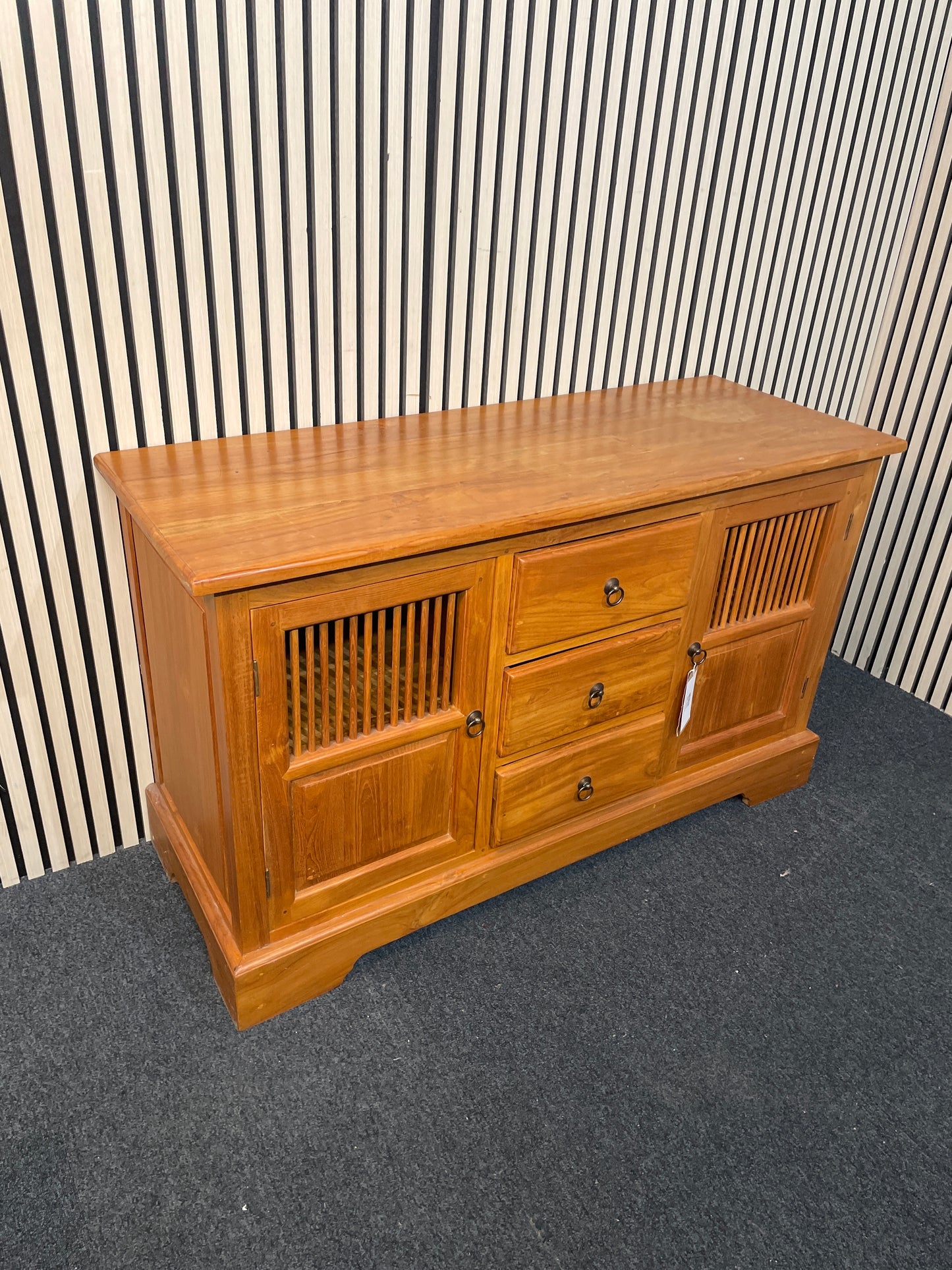 Solid teak stained low 2 door 3 drawer sideboard (H 75 x W 126 x D 47 cm) 2425