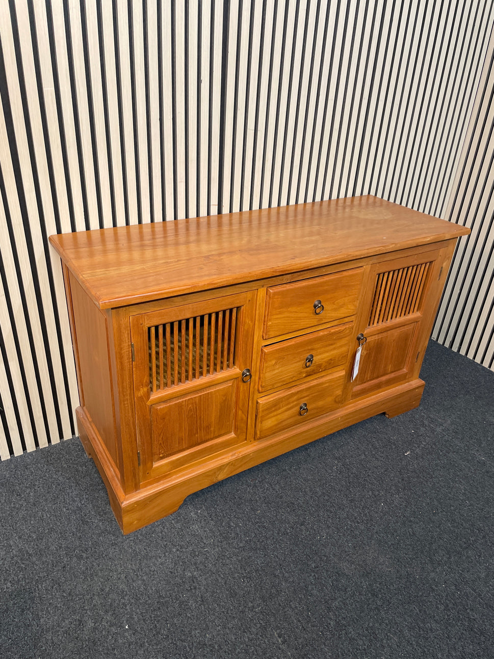 Solid teak stained low 2 door 3 drawer sideboard (H 75 x W 126 x D 47 cm) 2425