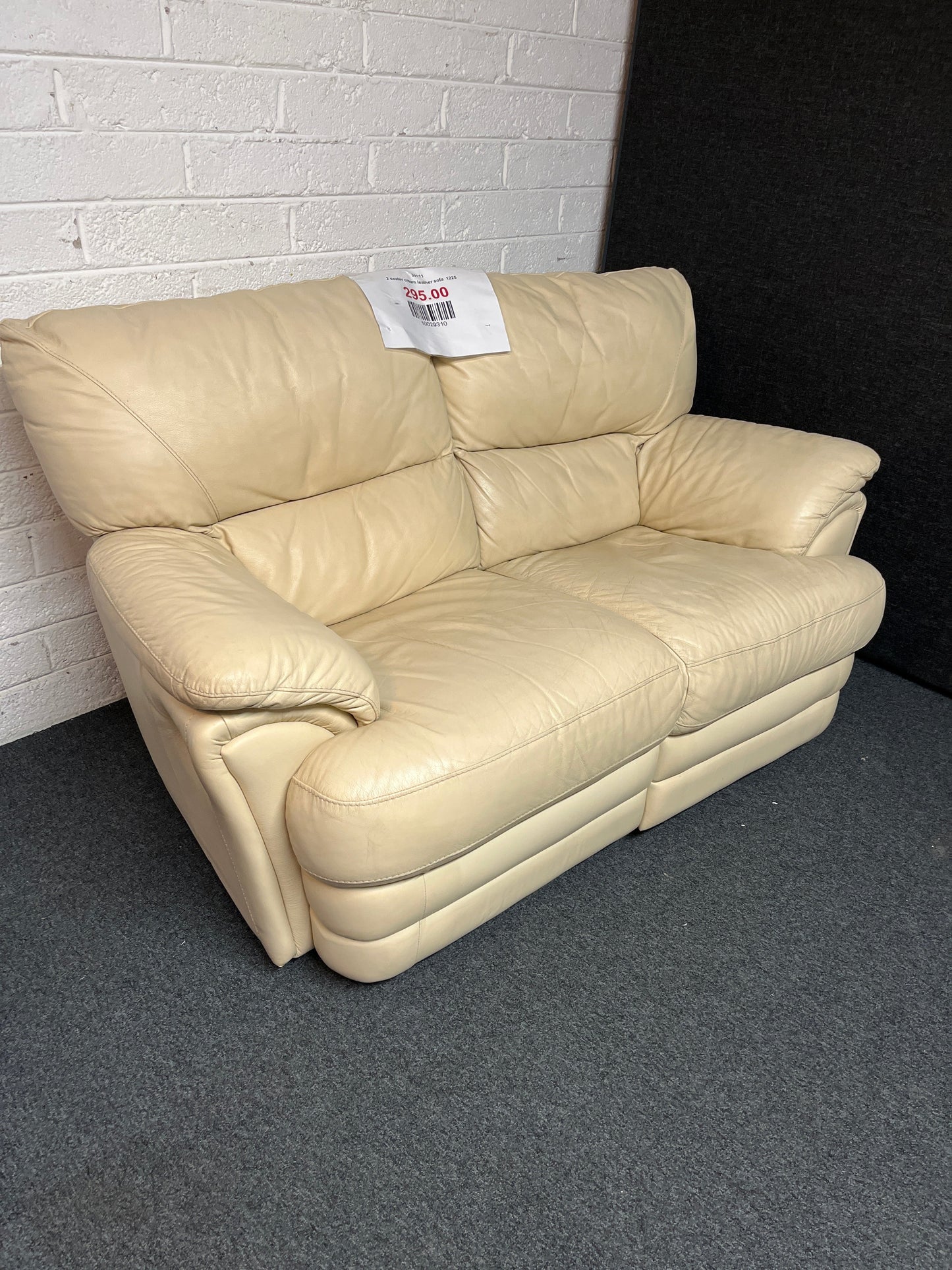 2 seater cream leather sofa  1225