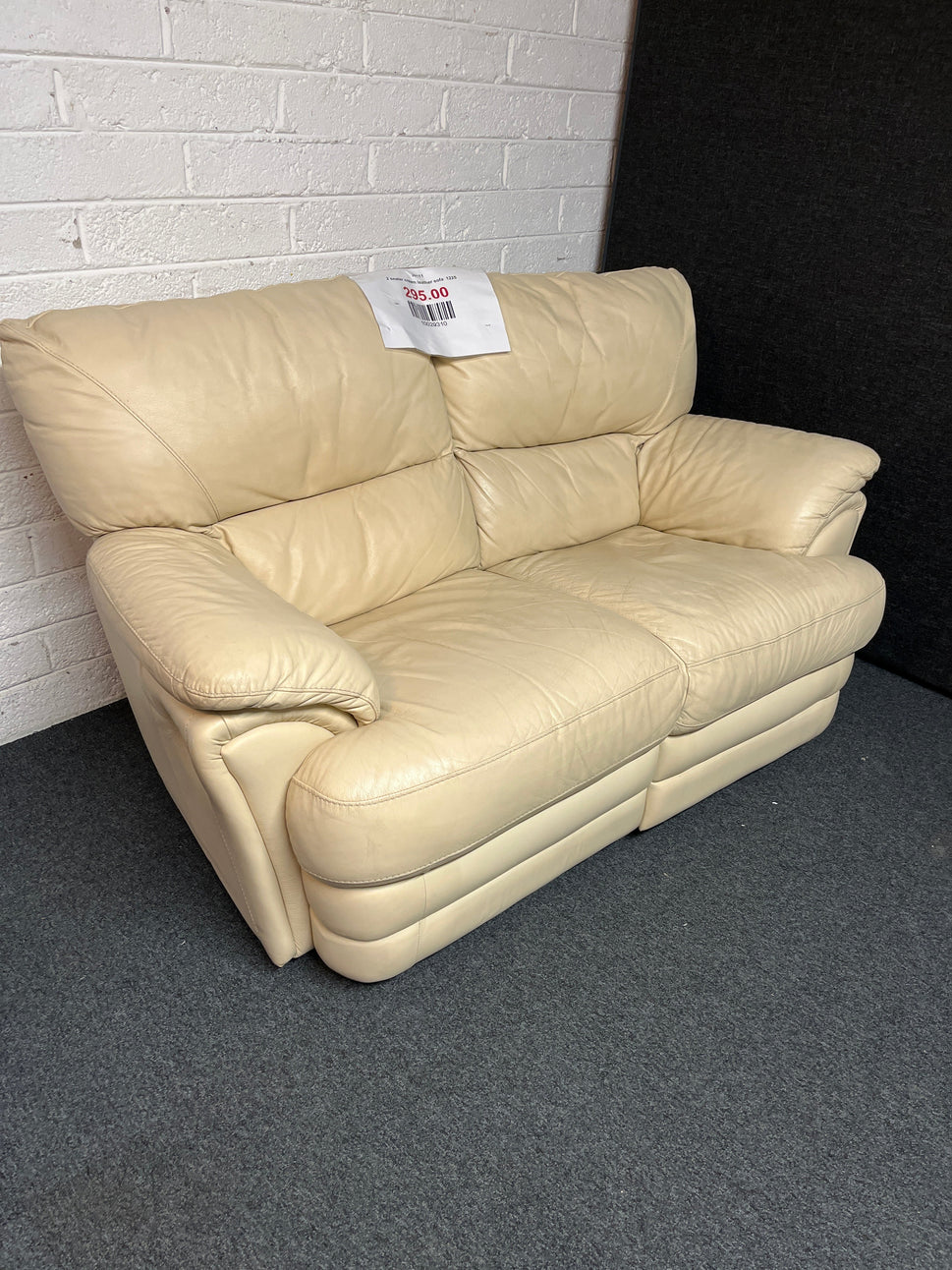 2 seater cream leather sofa  1225