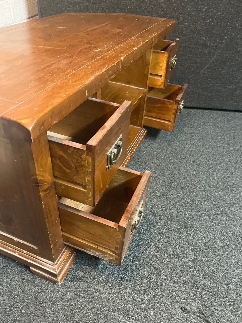 Solid dark wood stained 4 drawer low long TV unit (H 56 x W 116 x D 52 cm) 2225