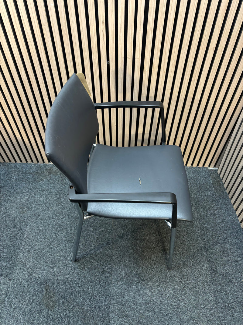Black pu leatherette stacking chair with arms