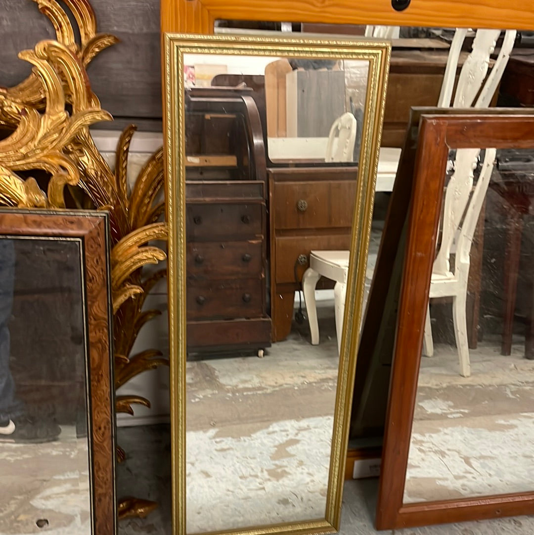 Gold framed slim rectangular mirror