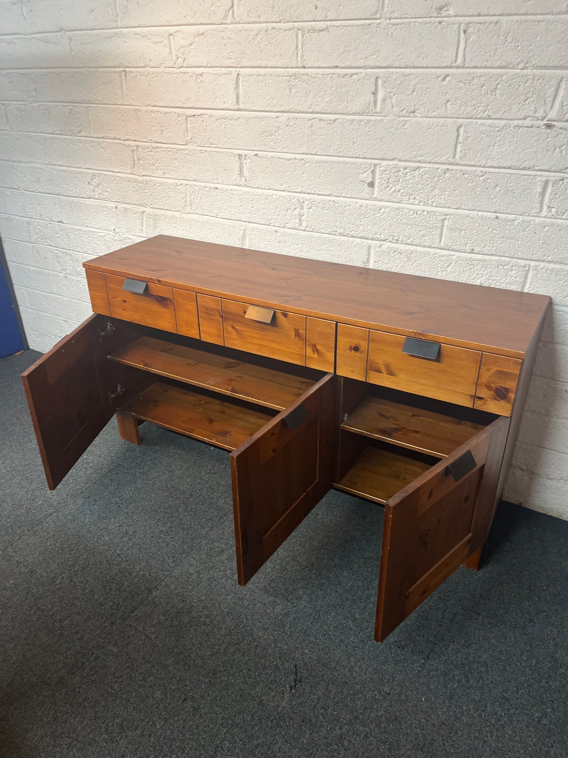 Long solid pine 3 door 3 drawer sideboard with black handles (H 74 x W 140 x D 40 cm) 1325