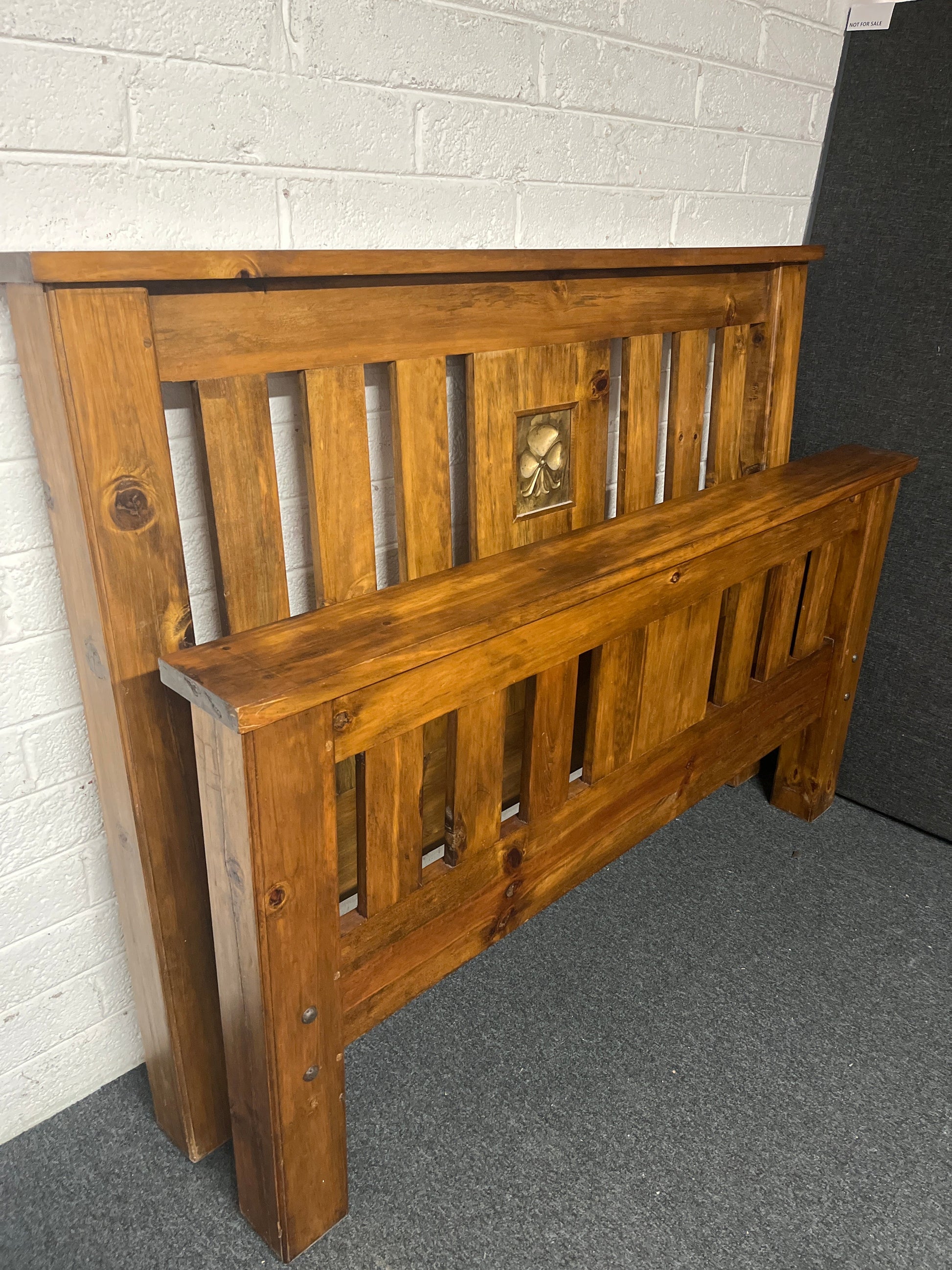 5ft high and low end ornate solid pine stained bed frame with central gold design  1225