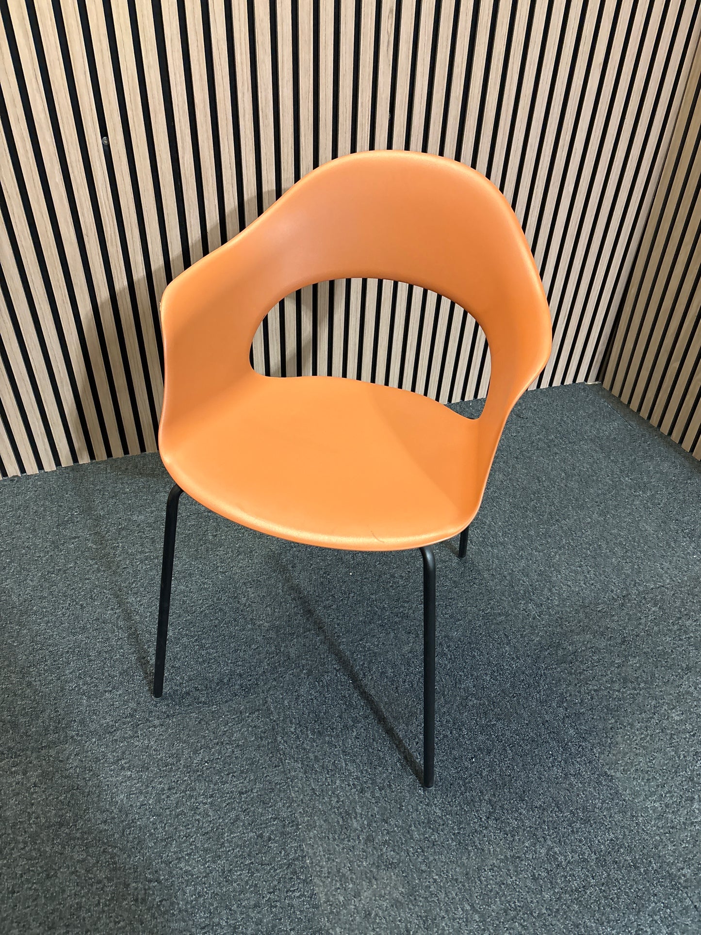 Reno single piece polyprop monoshell 4 legged chair in orange