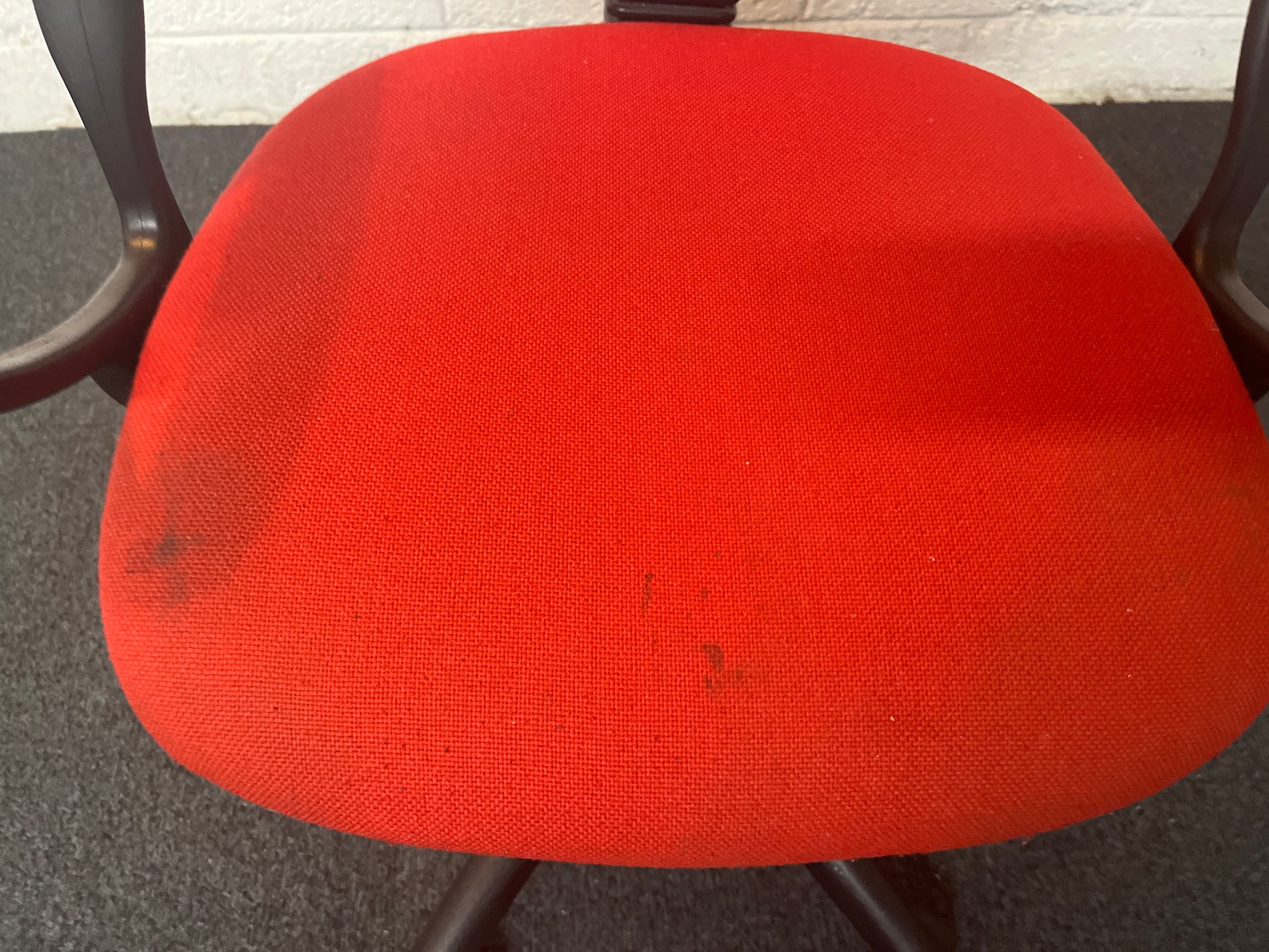 Red fabric swivel chair with black loop arms 1325