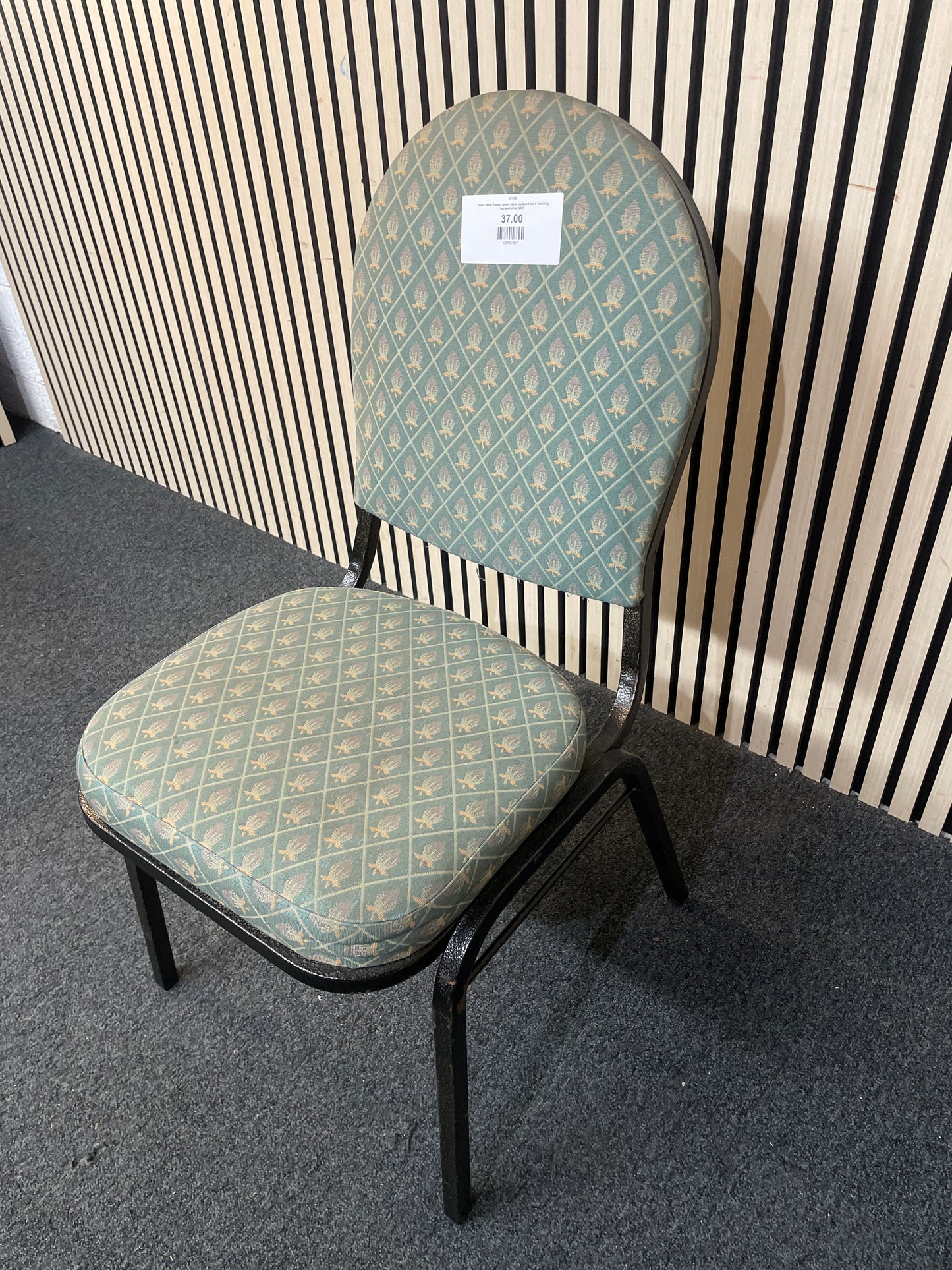  black metal framed green fabric seat and back stacking banquet chair 2425