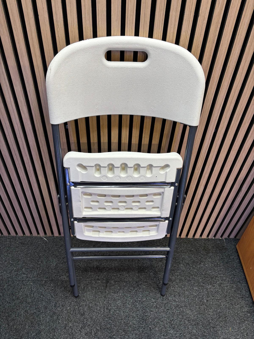 Ex Demo Hebe steel folding chair with blow moulded seat and back in white