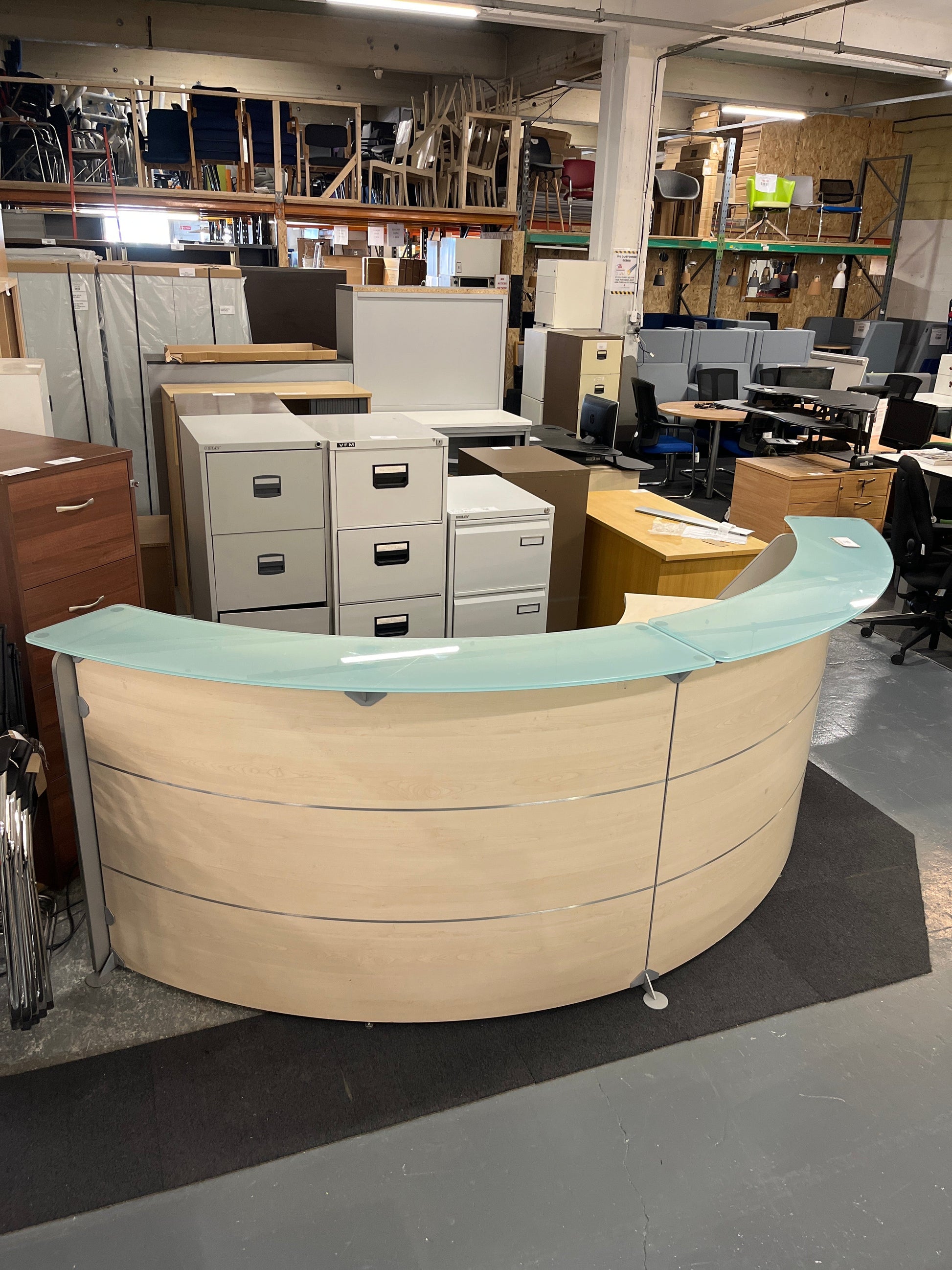 SECONDHAND  Maple laminate half moon sectional reception counter with maple worktop, toughened and frosted glass tops 
134cm from outside to centre each section