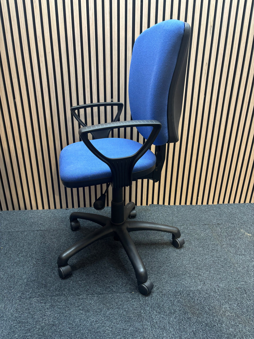 Shaped medium back blue fabric swivel chair with loop arms