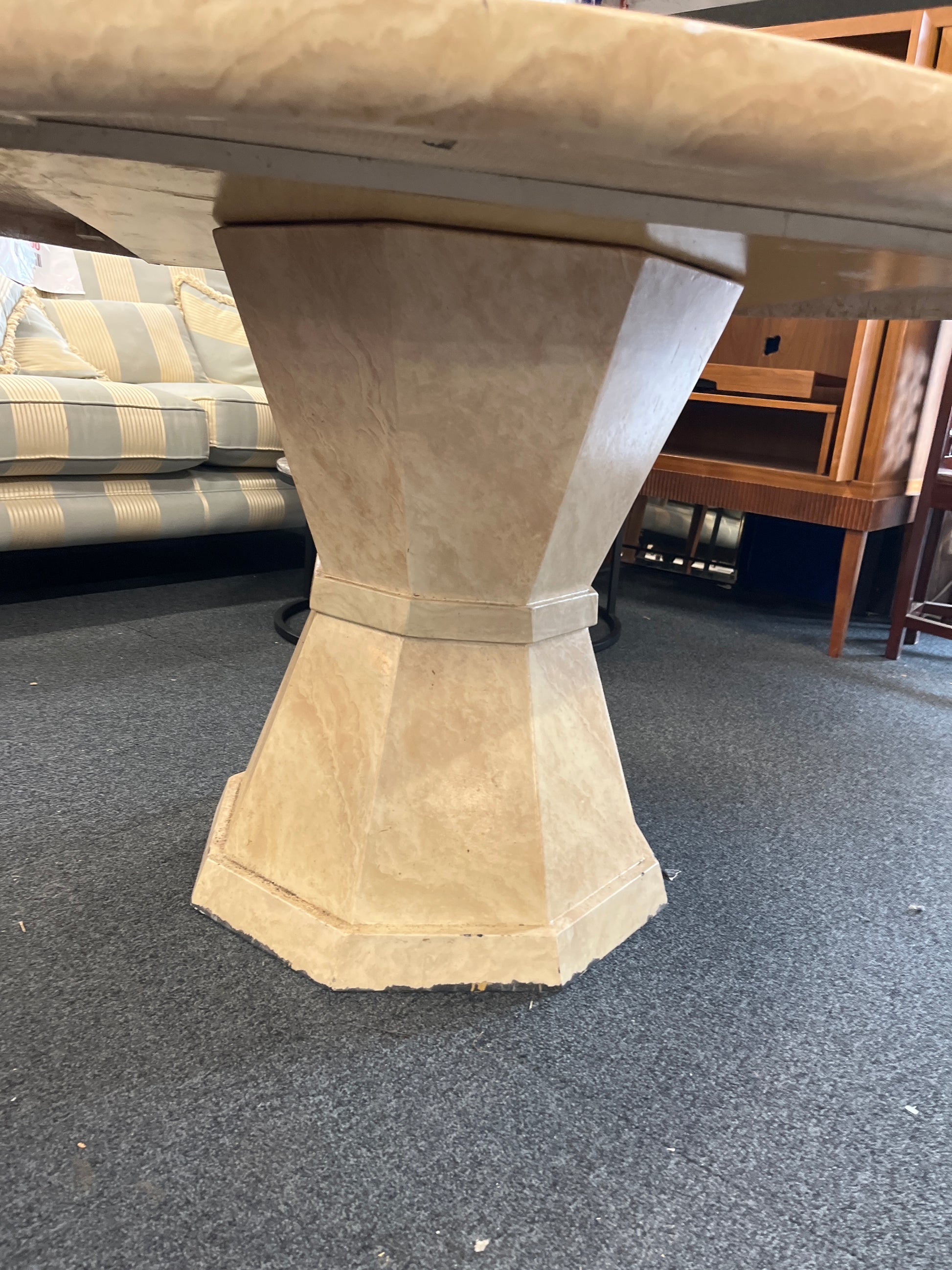 Cream marble effect circular 1300Wx760H central podium base dining table, note damage to parts of edge 2225